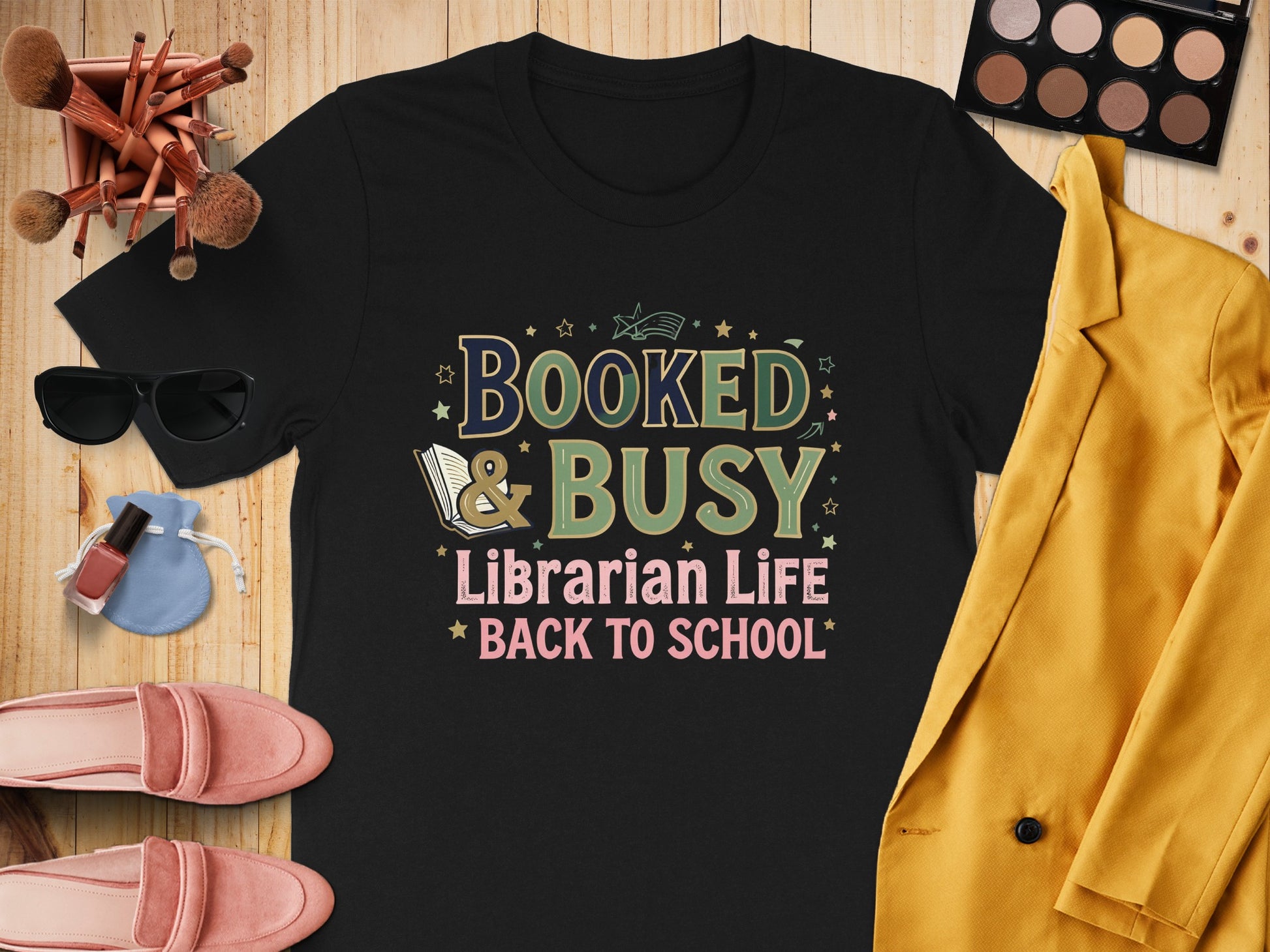 Black t-shirt with "Booked & Busy", "Librarian Life", "Back to School" text.