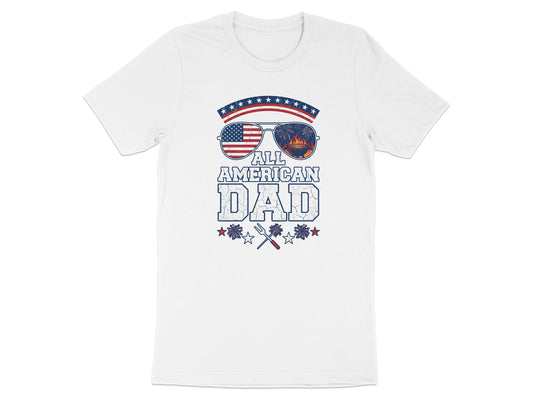 White t-shirt with "All American Dad" graphic featuring sunglasses and barbecue tools.