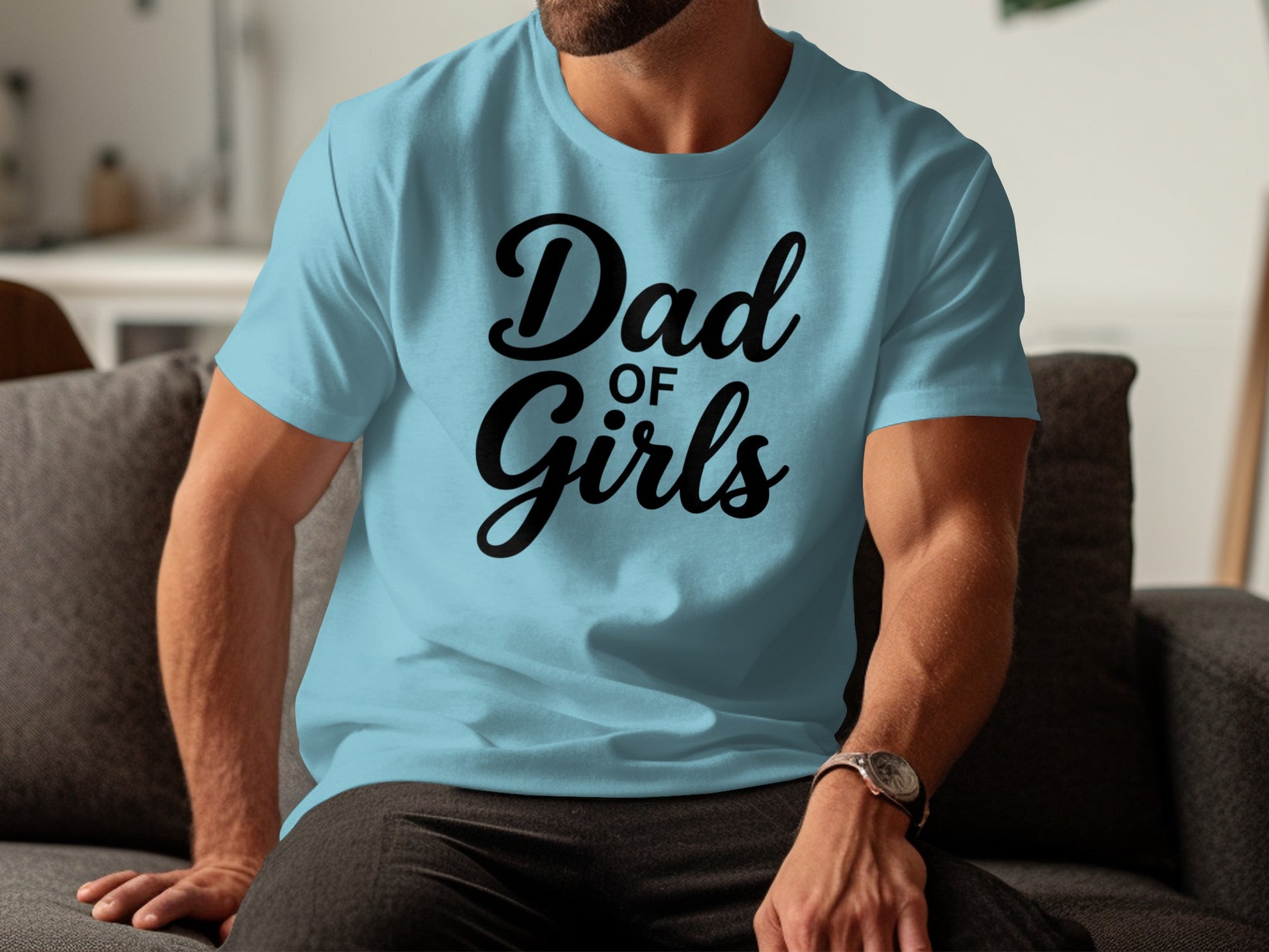 Light blue t-shirt with "Dad of Girls" text in black cursive.