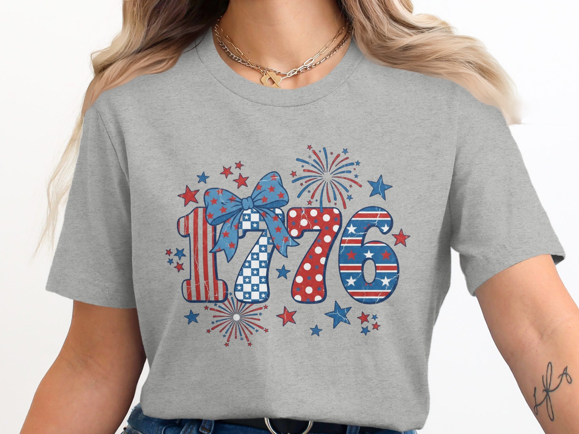 Grey t-shirt with "1776" in patriotic red, white, and blue patterns.