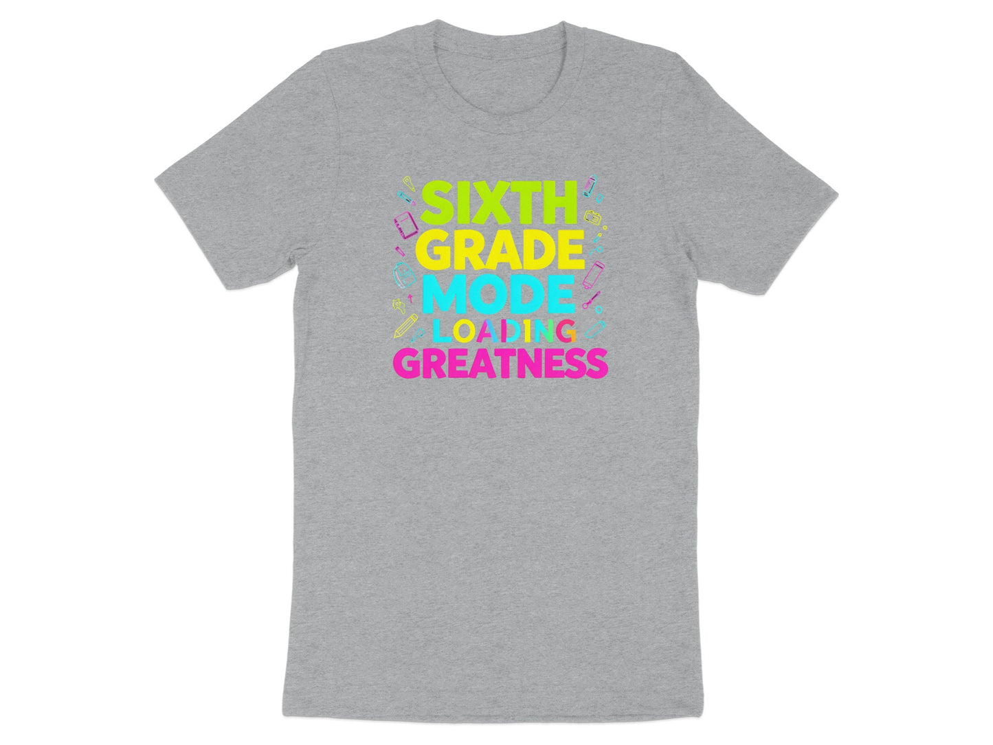 Gray t-shirt with "Sixth Grade Mode Loading Greatness" text and school supplies.