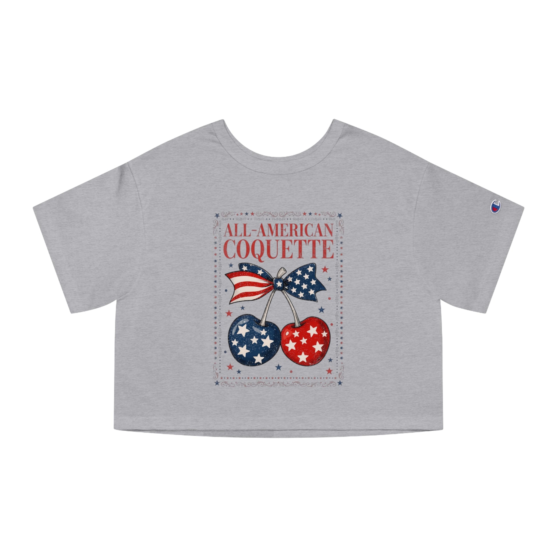 Grey crop top with "All-American Coquette" text and patriotic cherries design.