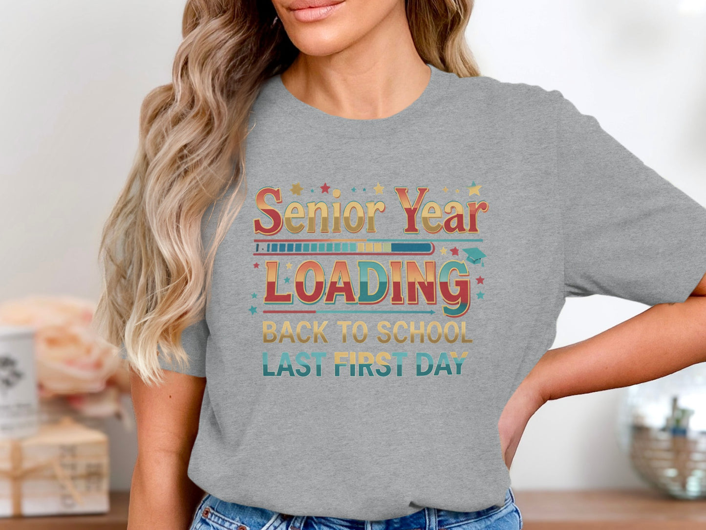Grey t-shirt with "Senior Year LOADING Back to School Last First Day" design.