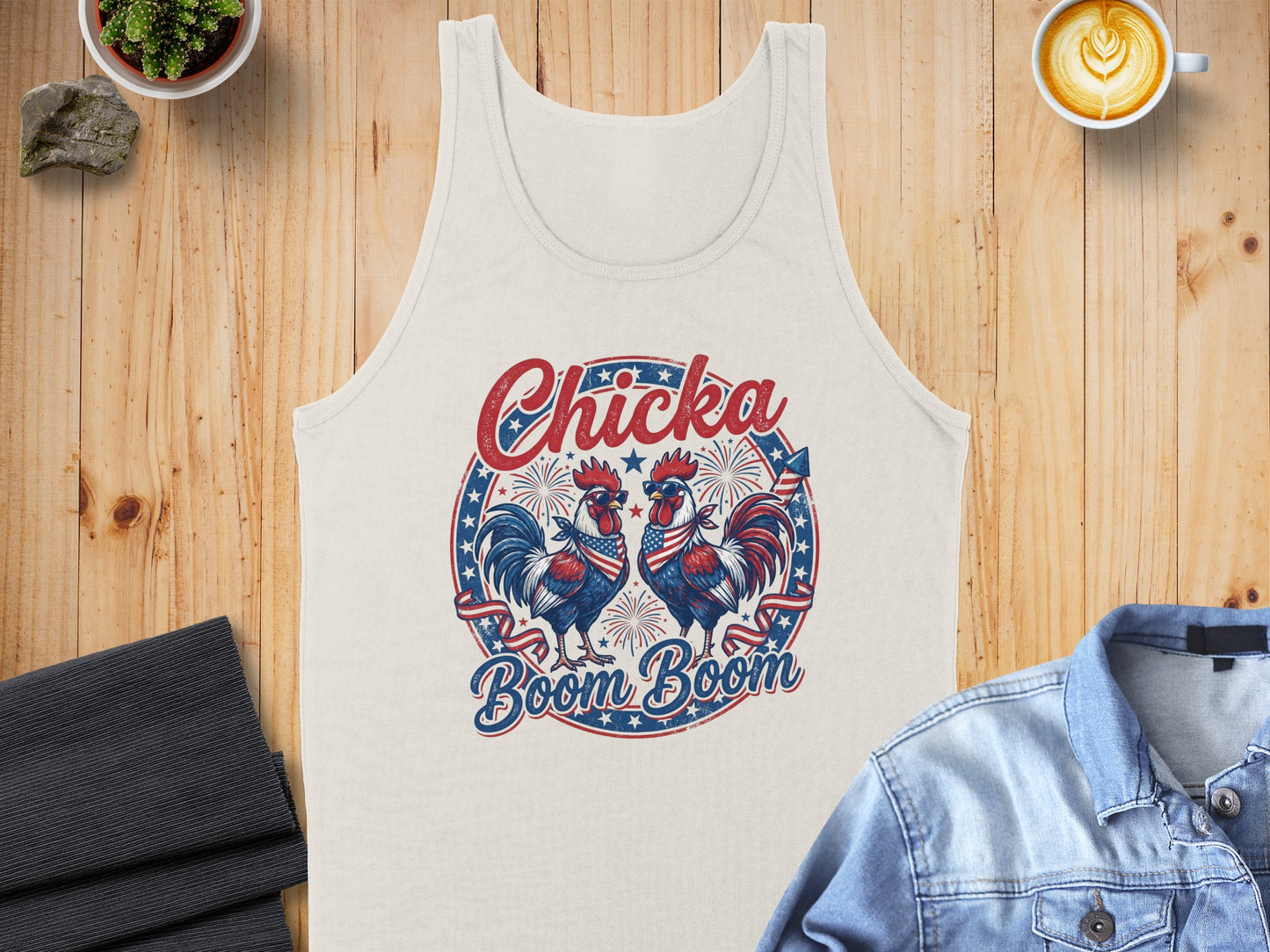 Cream tank top with two roosters in patriotic bandanas and sunglasses, "Chicka Boom Boom" text.
