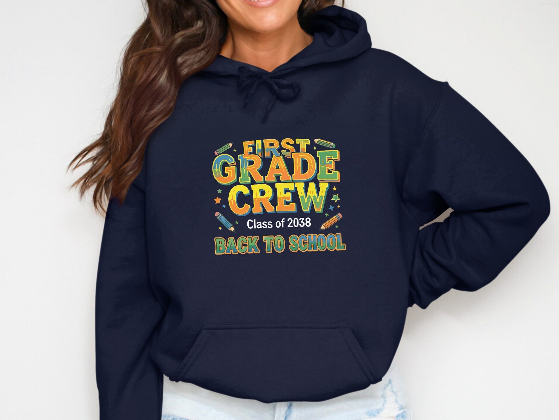 Navy blue hoodie with "First Grade Crew" and "Class of 2038 Back to School" text.