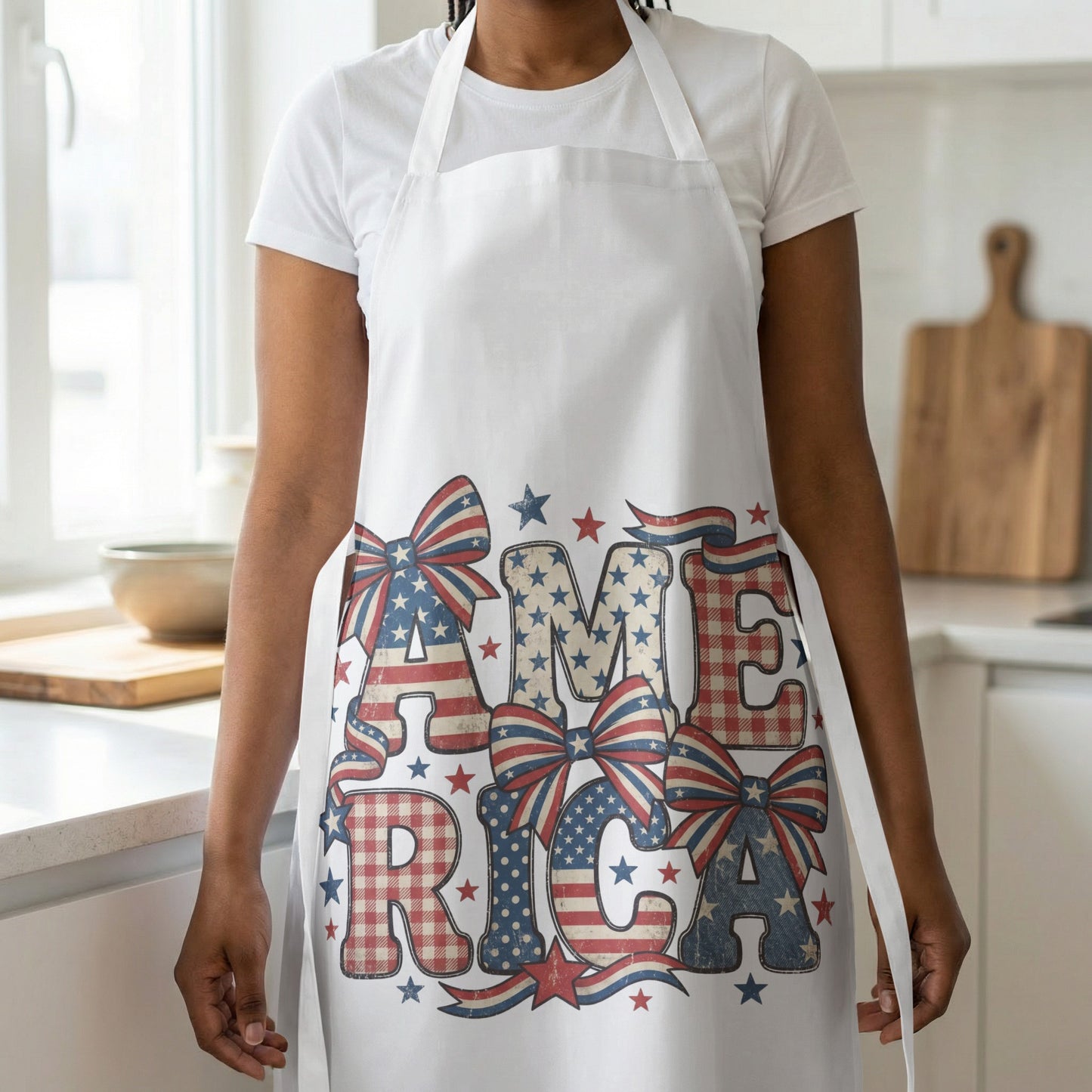 White apron with "AMERICA" text in patriotic patterns and bows.