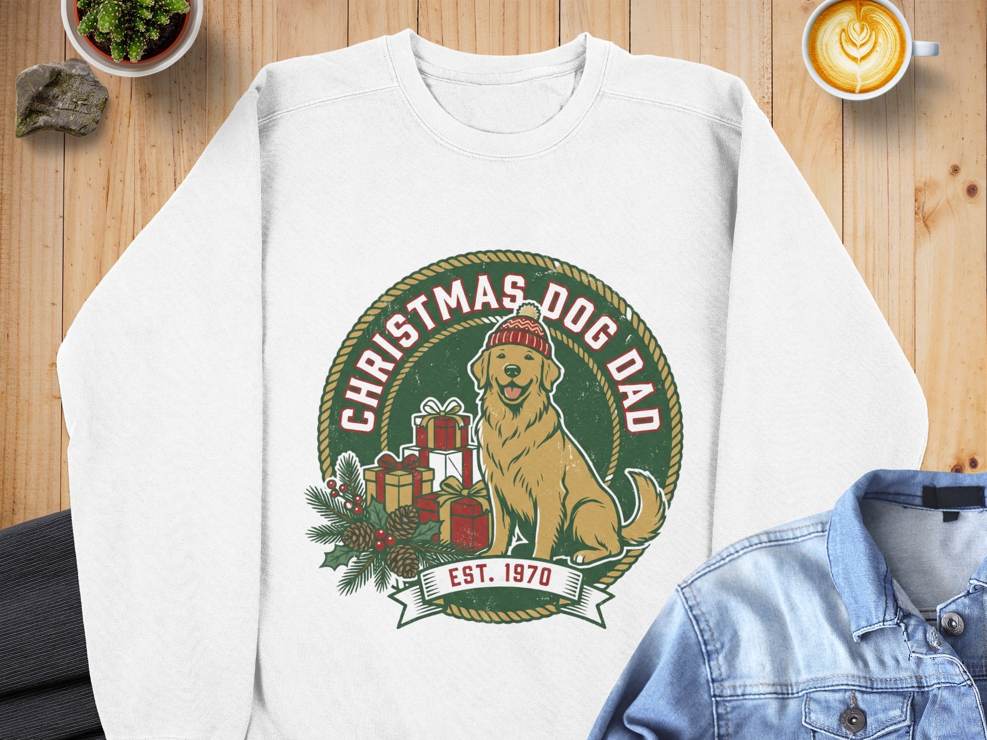 White crewneck sweatshirt with "Christmas Dog Dad Est. 1970" graphic.