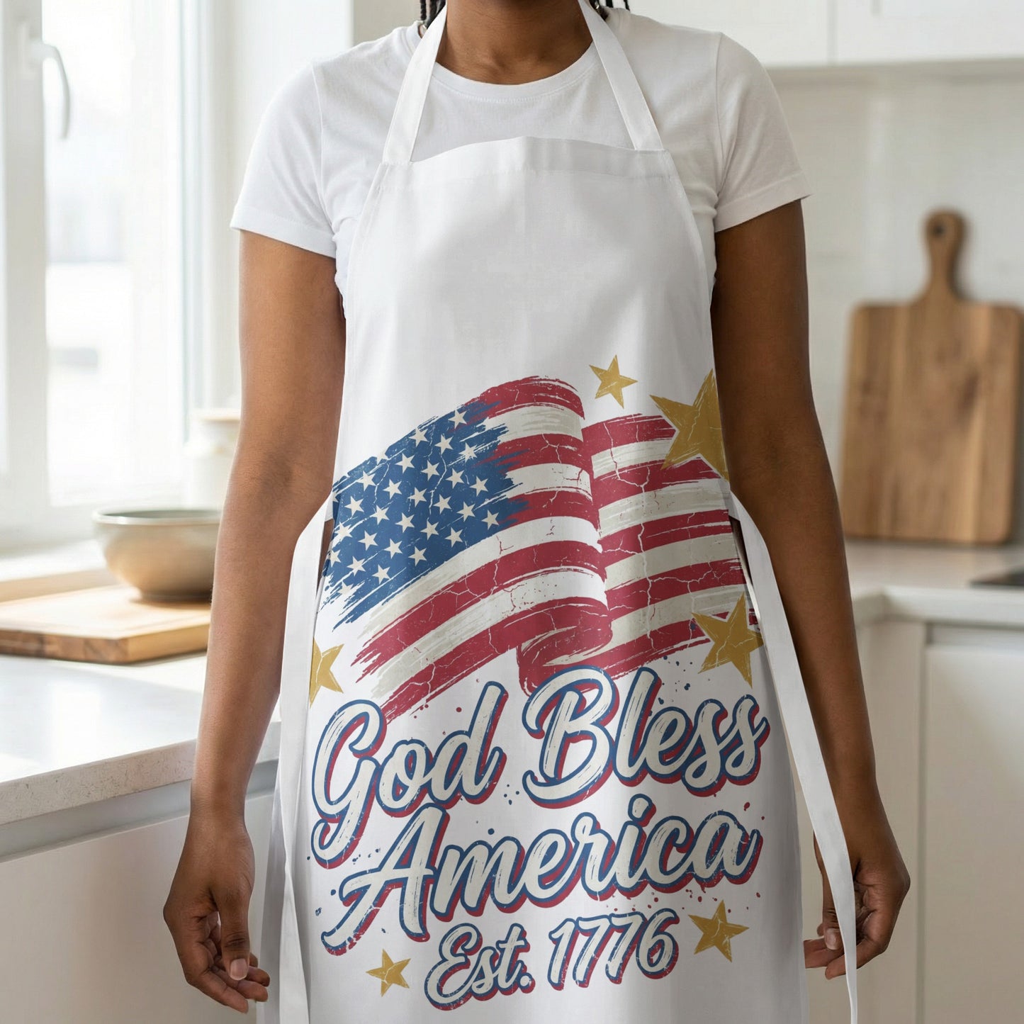 White apron with distressed American flag and "God Bless America Est. 1776" text.
