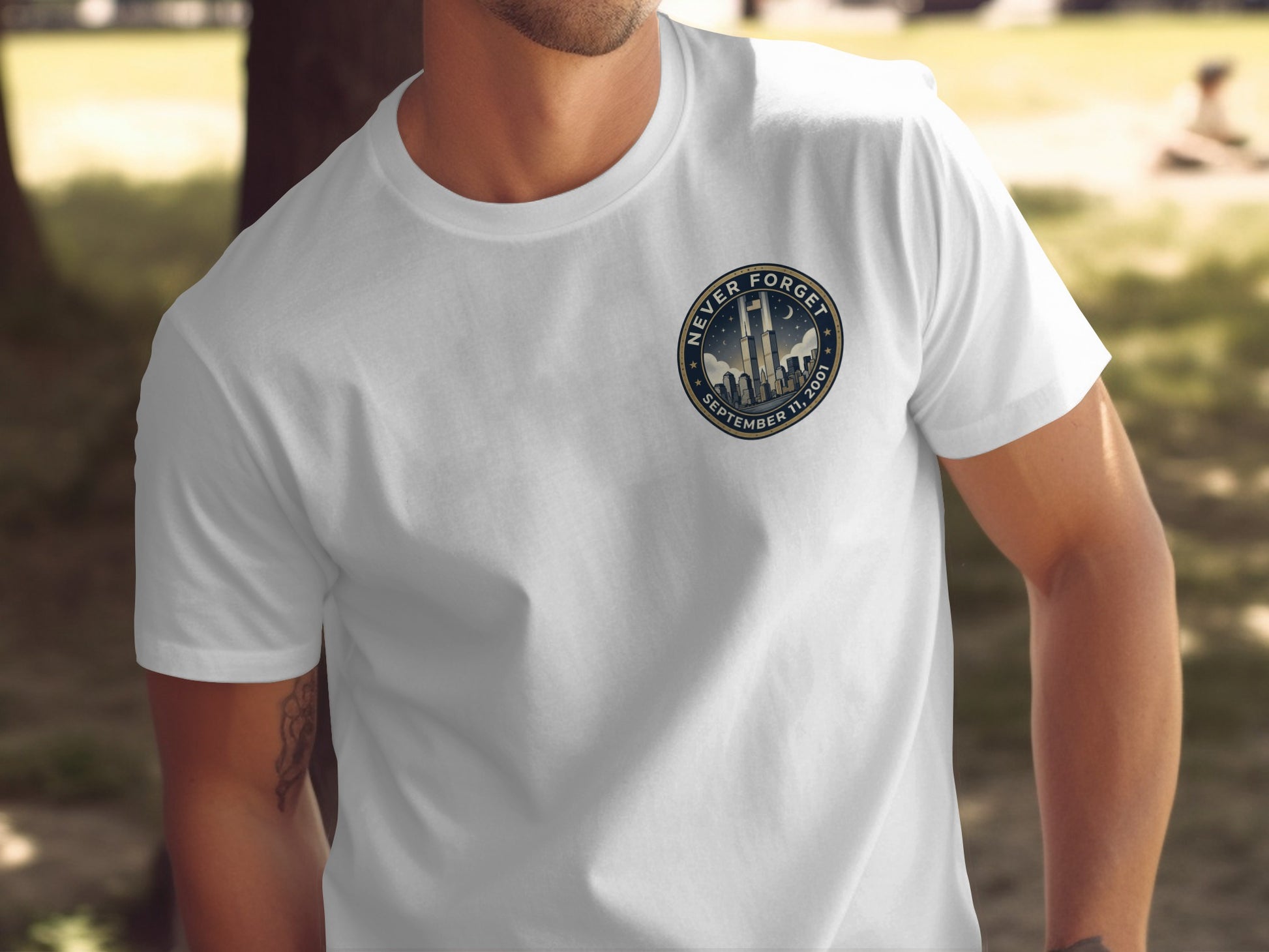 White t-shirt with "Never Forget September 11, 2001" text and Twin Towers emblem.