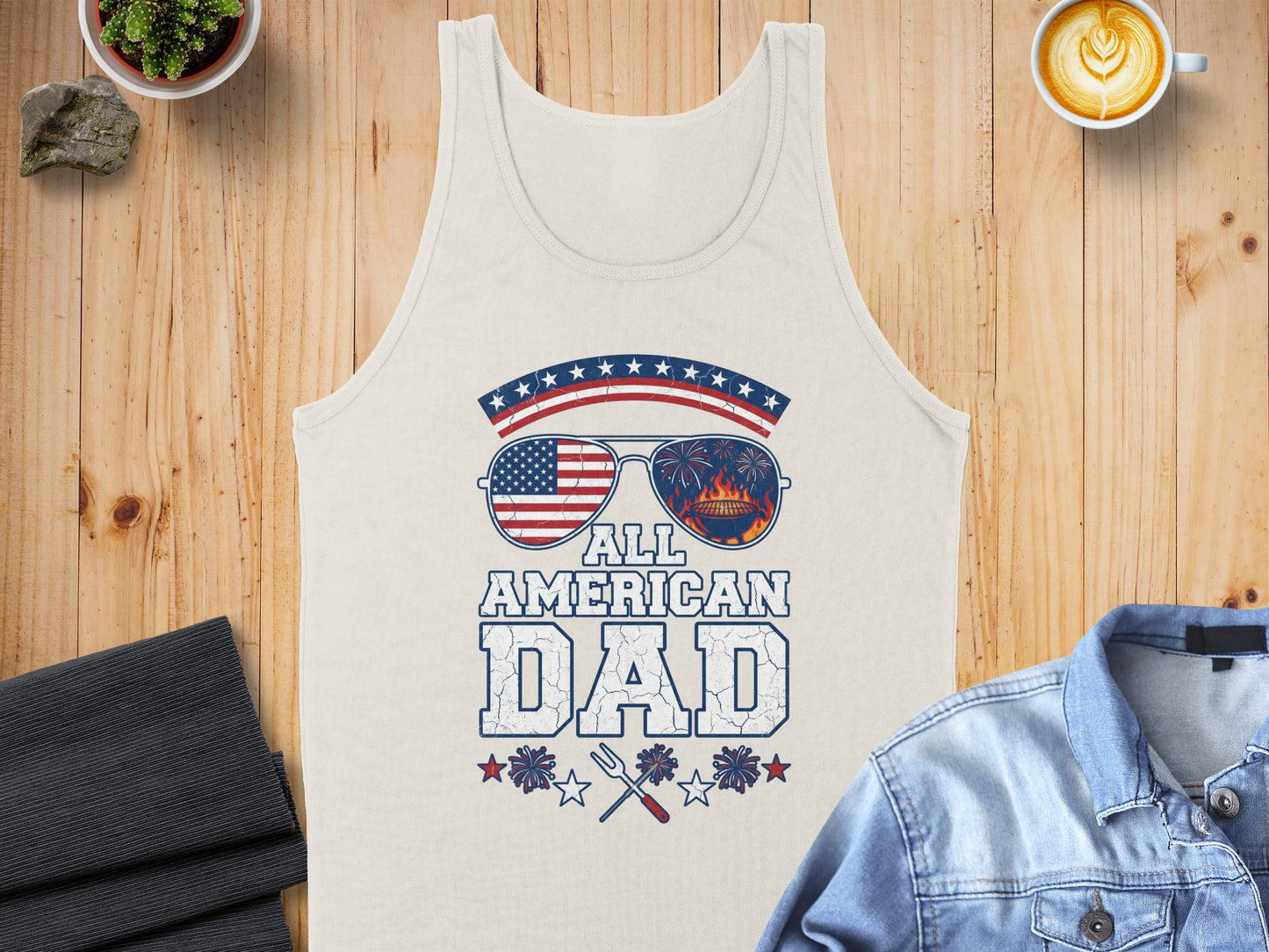 White tank top with "ALL AMERICAN DAD" text and patriotic sunglasses graphic.