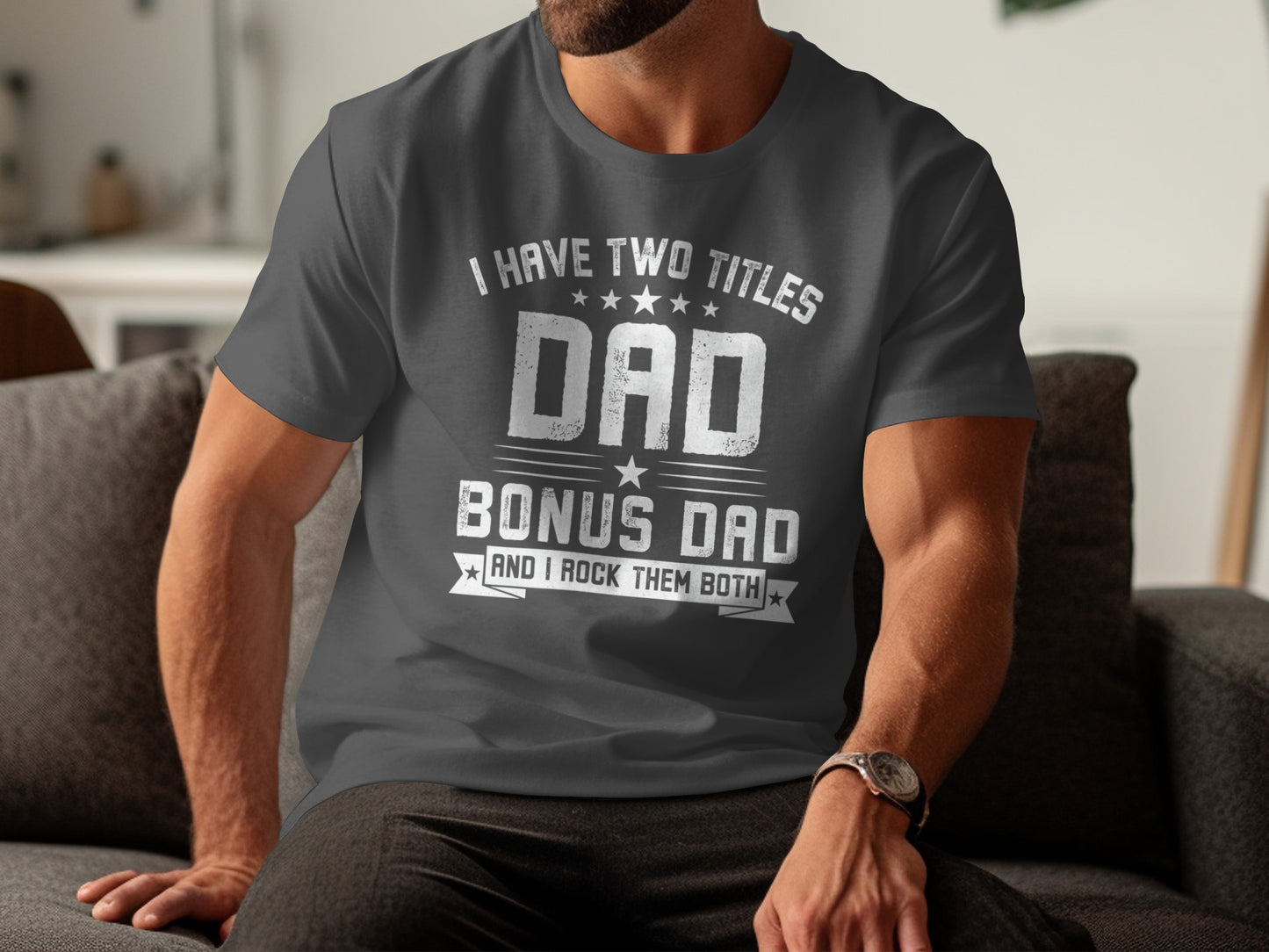 Dark gray t-shirt with white text: "I Have Two Titles Dad Bonus Dad And I Rock Them Both".
