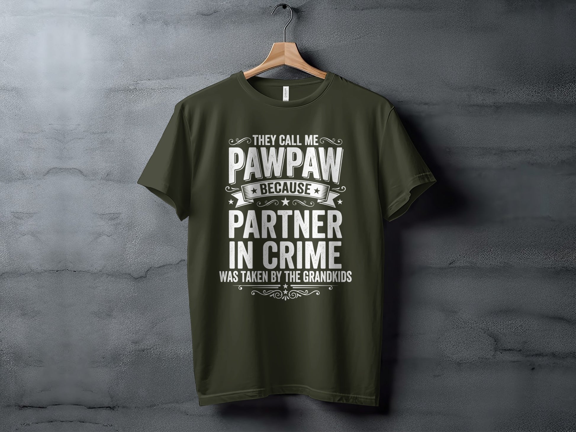 Dark green t-shirt with "They call me Pawpaw because partner in crime was taken by the grandkids."