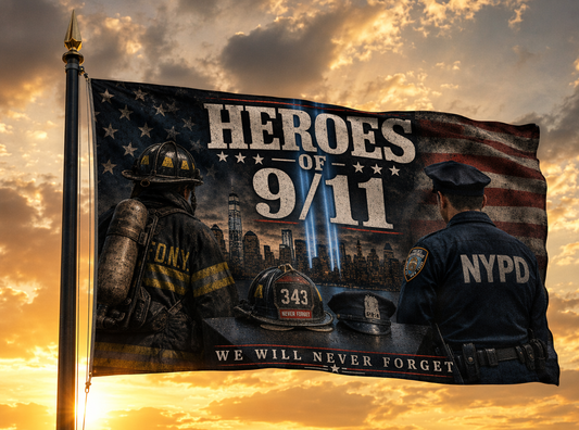 Heroes of 9/11 flag on flagpole against sunset sky