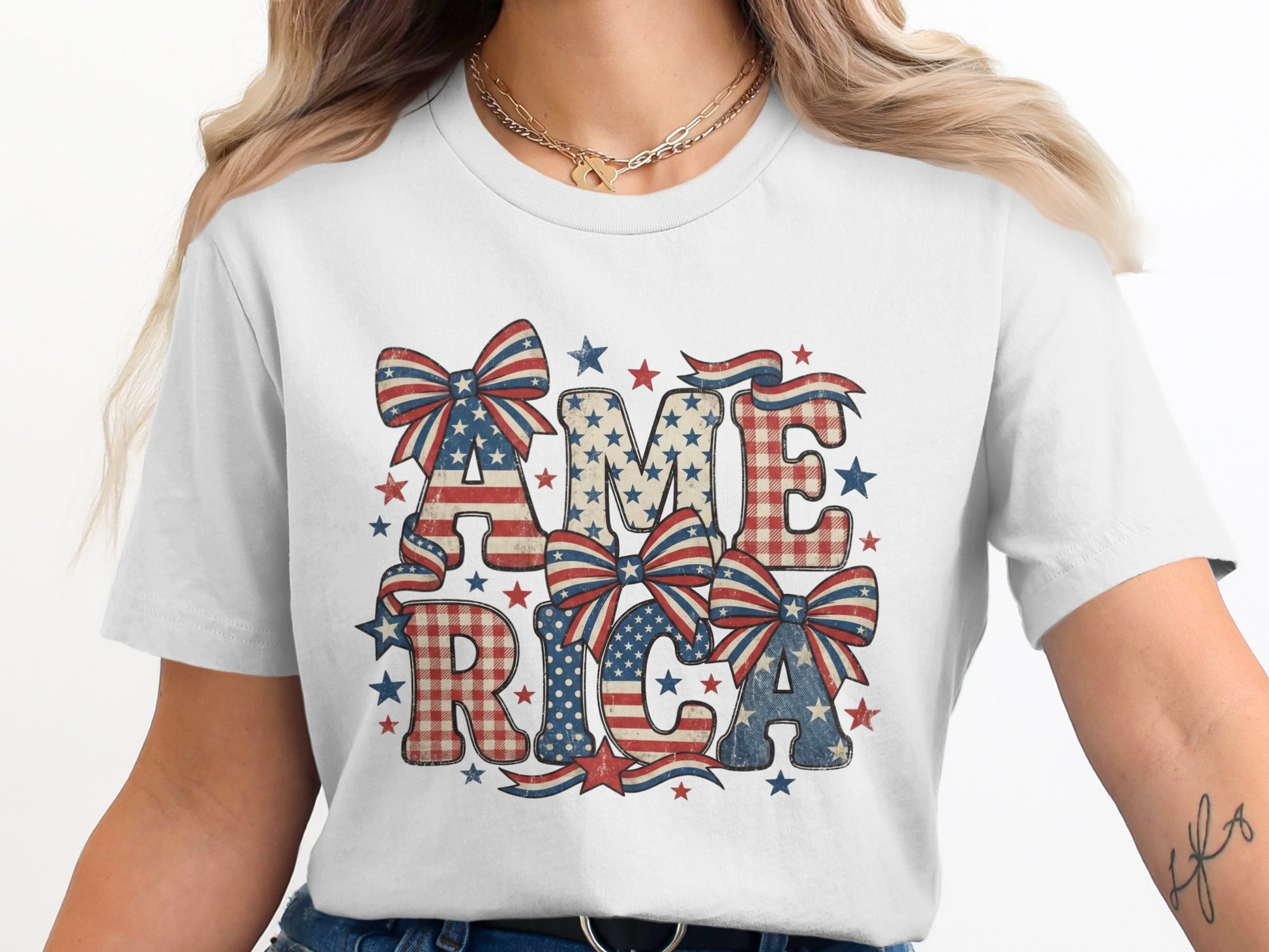 White t-shirt with "AMERICA" in patriotic checkered and star-spangled letters.