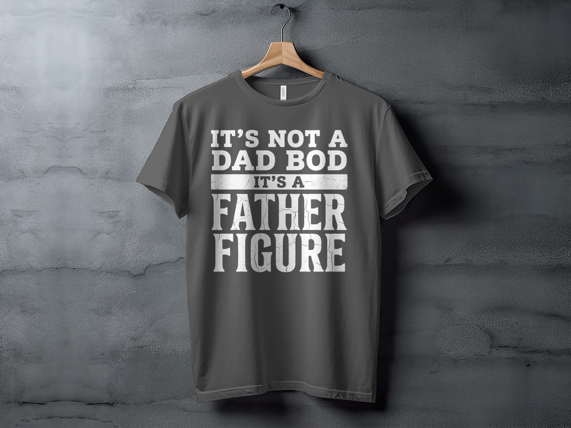 Dark grey t-shirt with "IT'S NOT A DAD BOD IT'S A FATHER FIGURE" text.