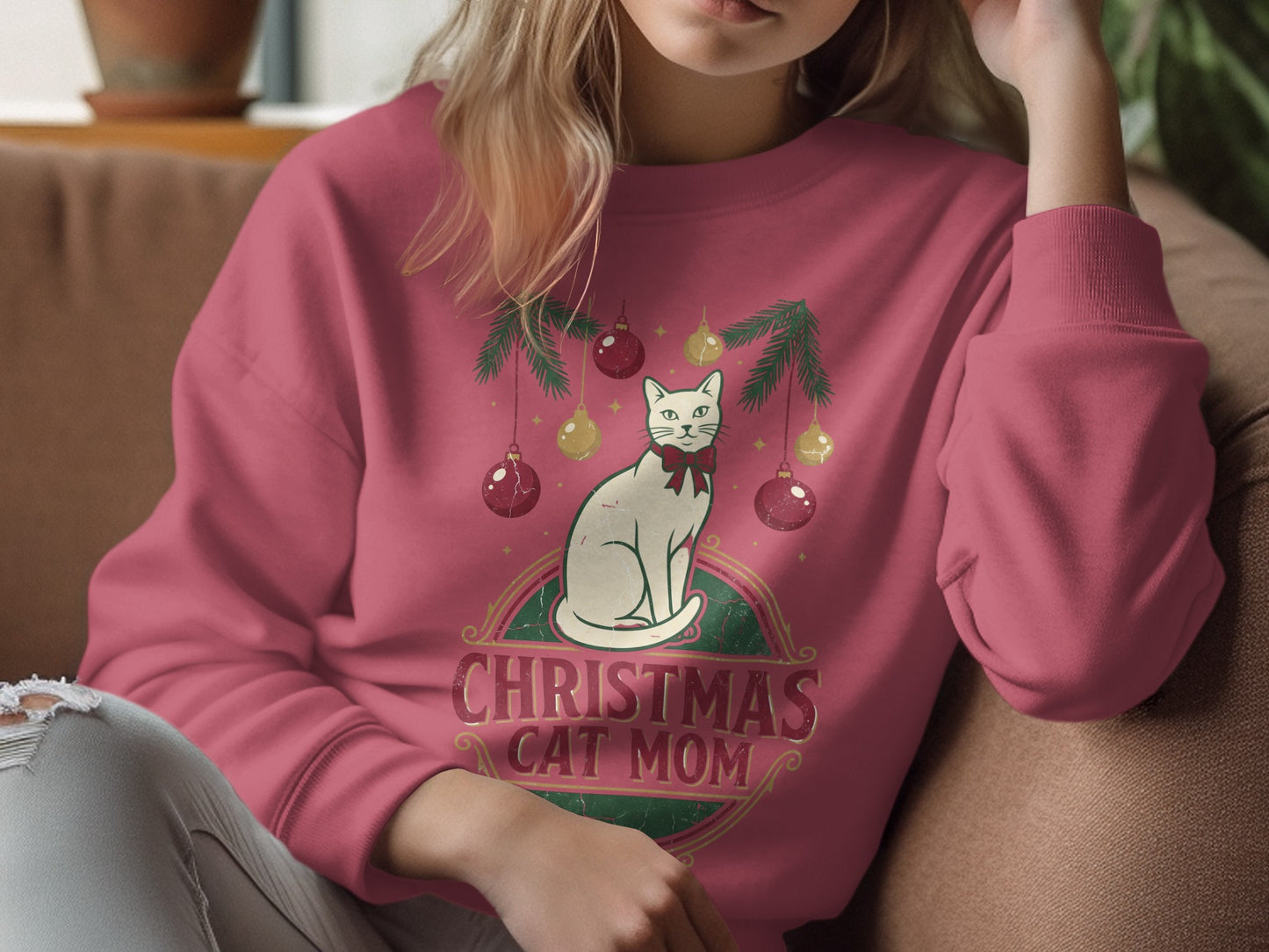 Crewneck sweatshirt with a white cat, Christmas ornaments, and "Christmas Cat Mom" text.