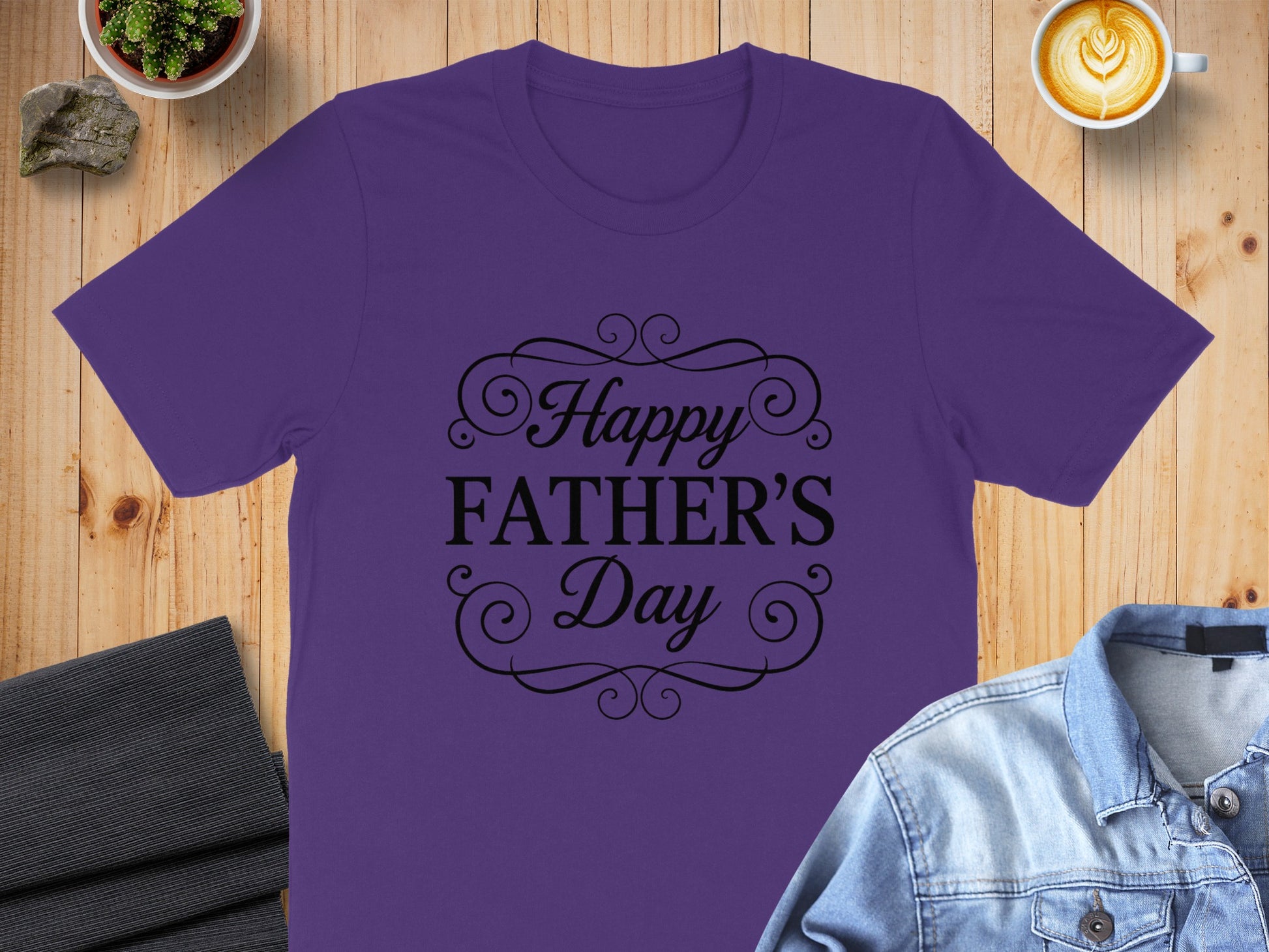 Purple t-shirt with "Happy Father's Day" text in decorative black font.