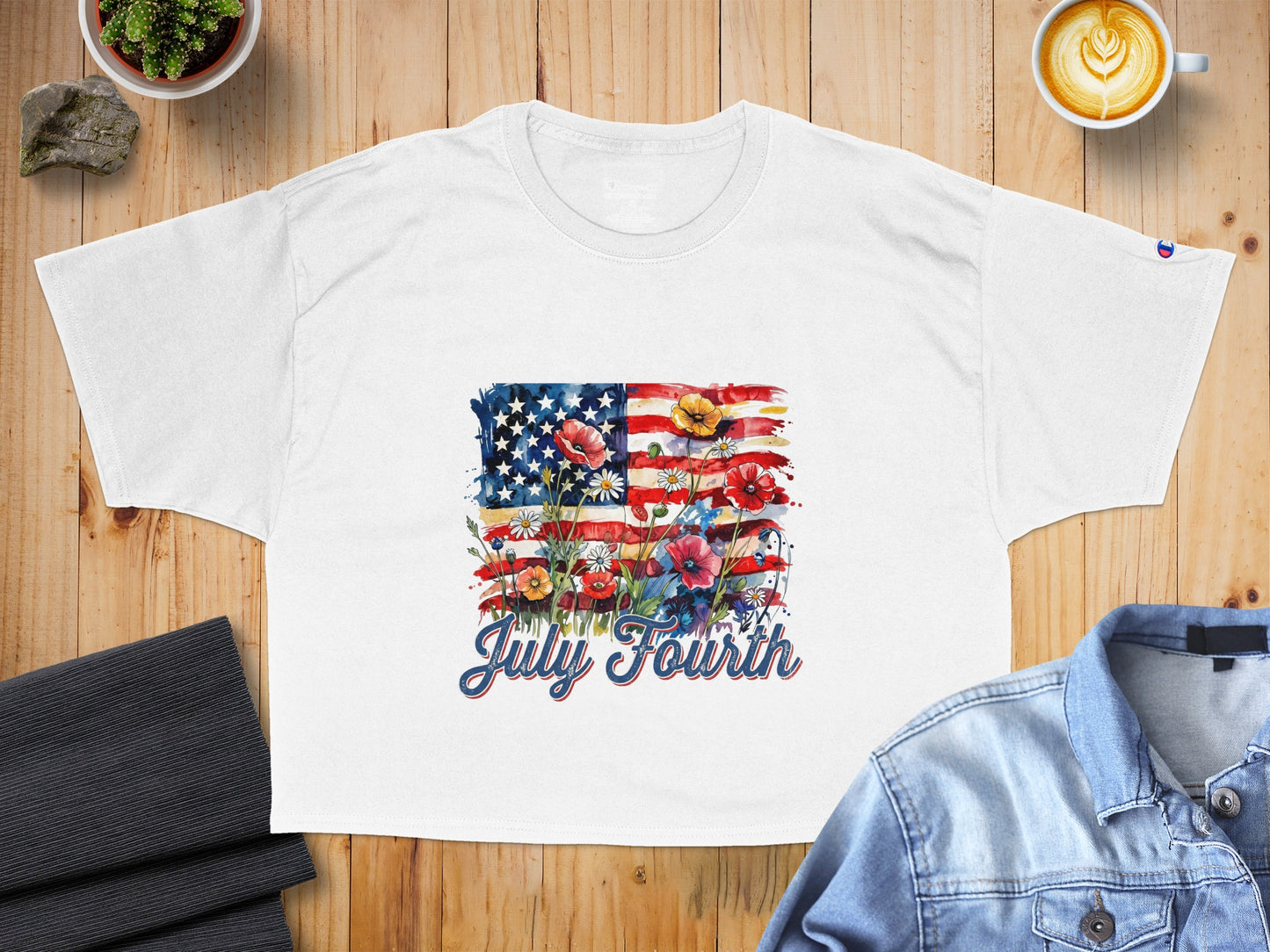 White t-shirt with American flag and floral design, says "July Fourth".