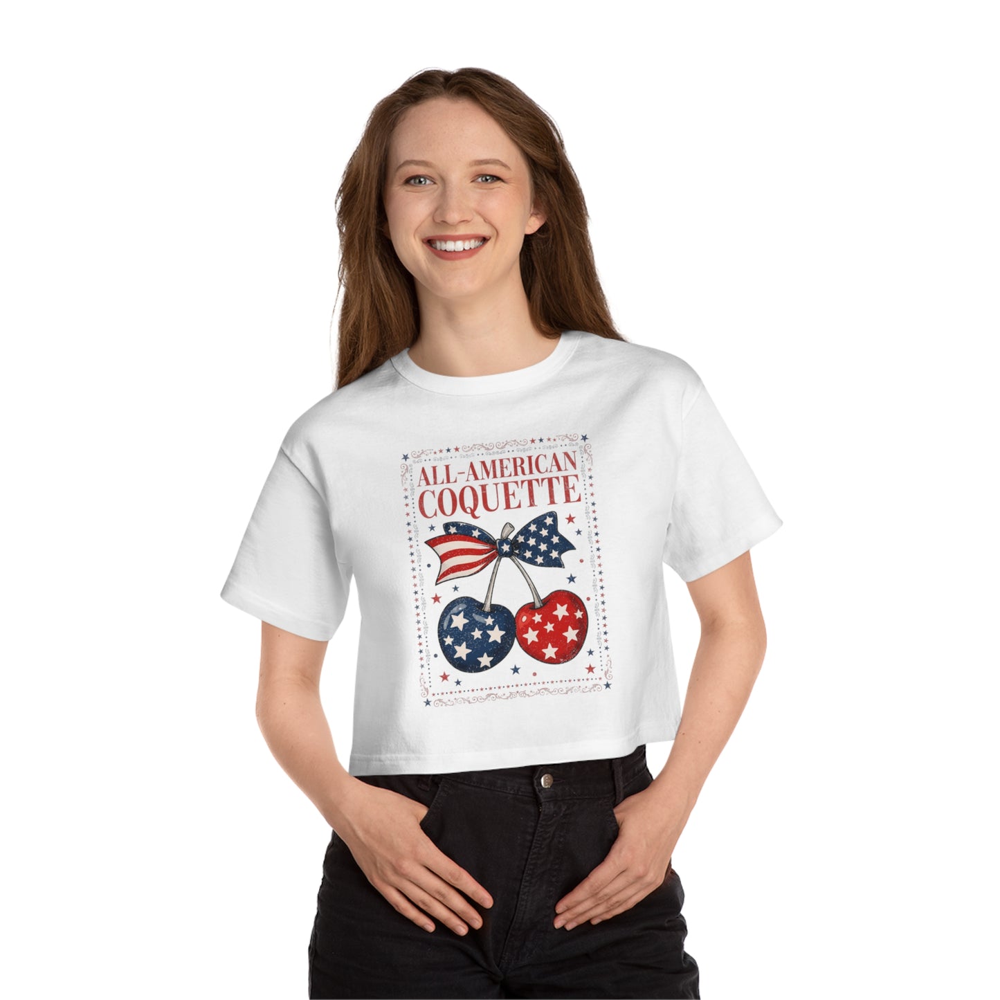 White crop top with "ALL-AMERICAN COQUETTE" text and patriotic cherries.