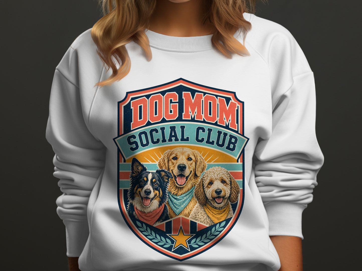 White sweatshirt with "Dog Mom Social Club" crest featuring three dogs.