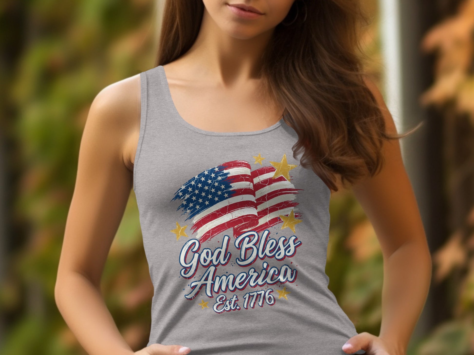 Grey tank top with distressed American flag graphic and "God Bless America Est. 1776" text.