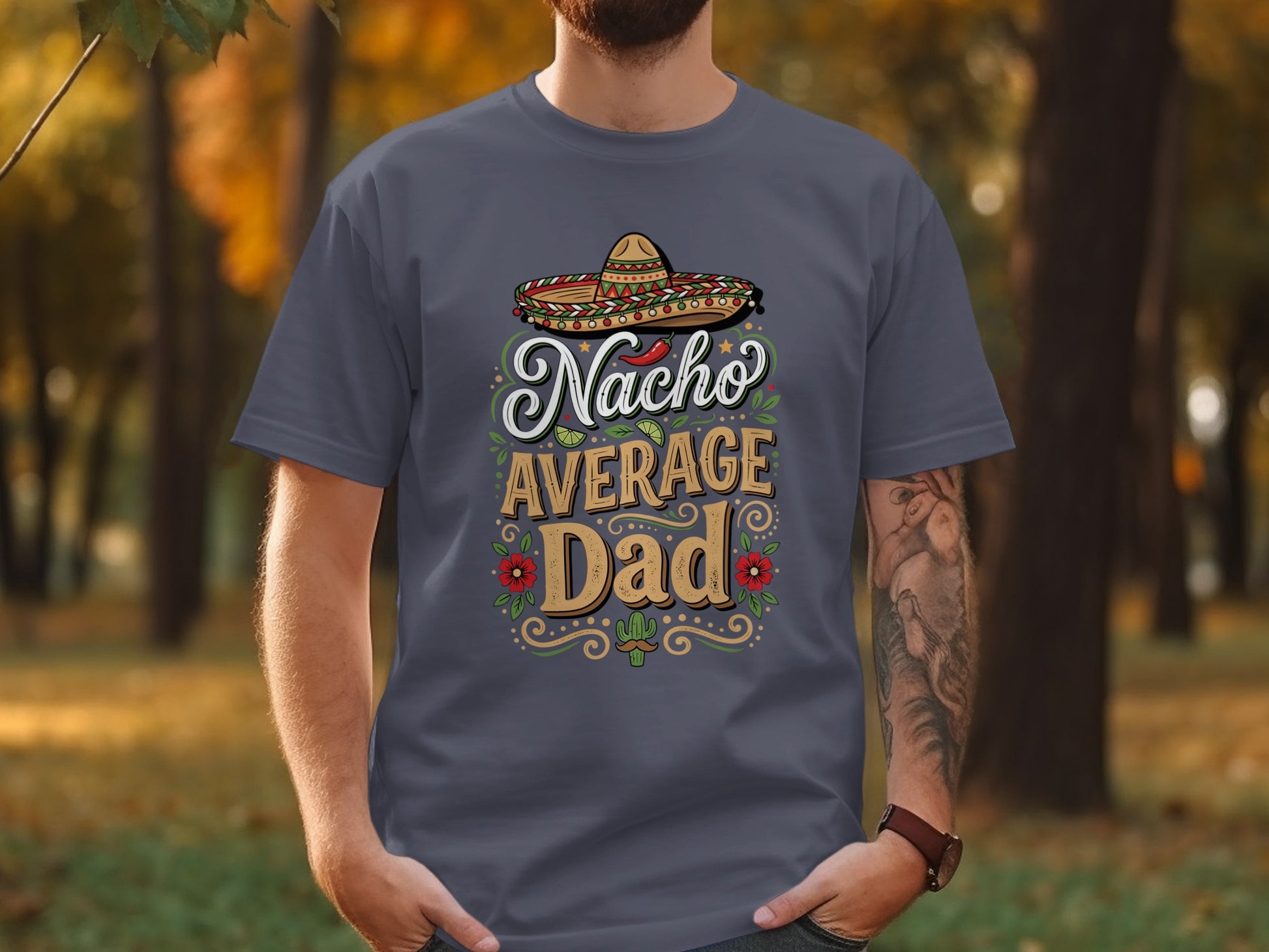 Nacho Average Dad text with sombrero, mustache, and flowers on a t-shirt.