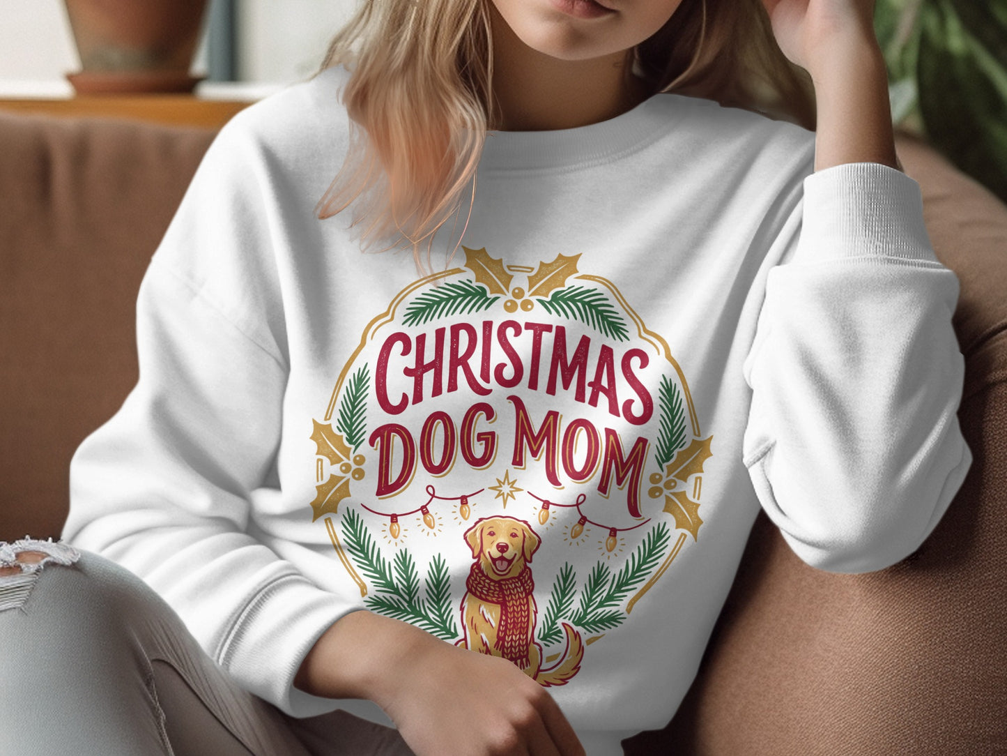 White sweatshirt with "Christmas Dog Mom" graphic featuring a dog in a scarf.