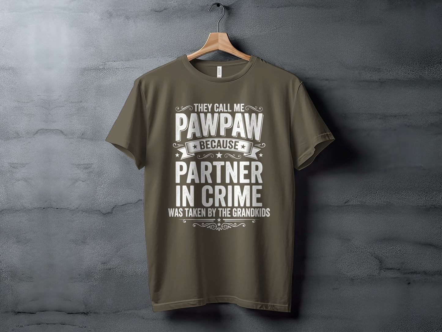 Brown t-shirt with white text "They Call Me Pawpaw Because Partner In Crime Was Taken By The Grandkids".