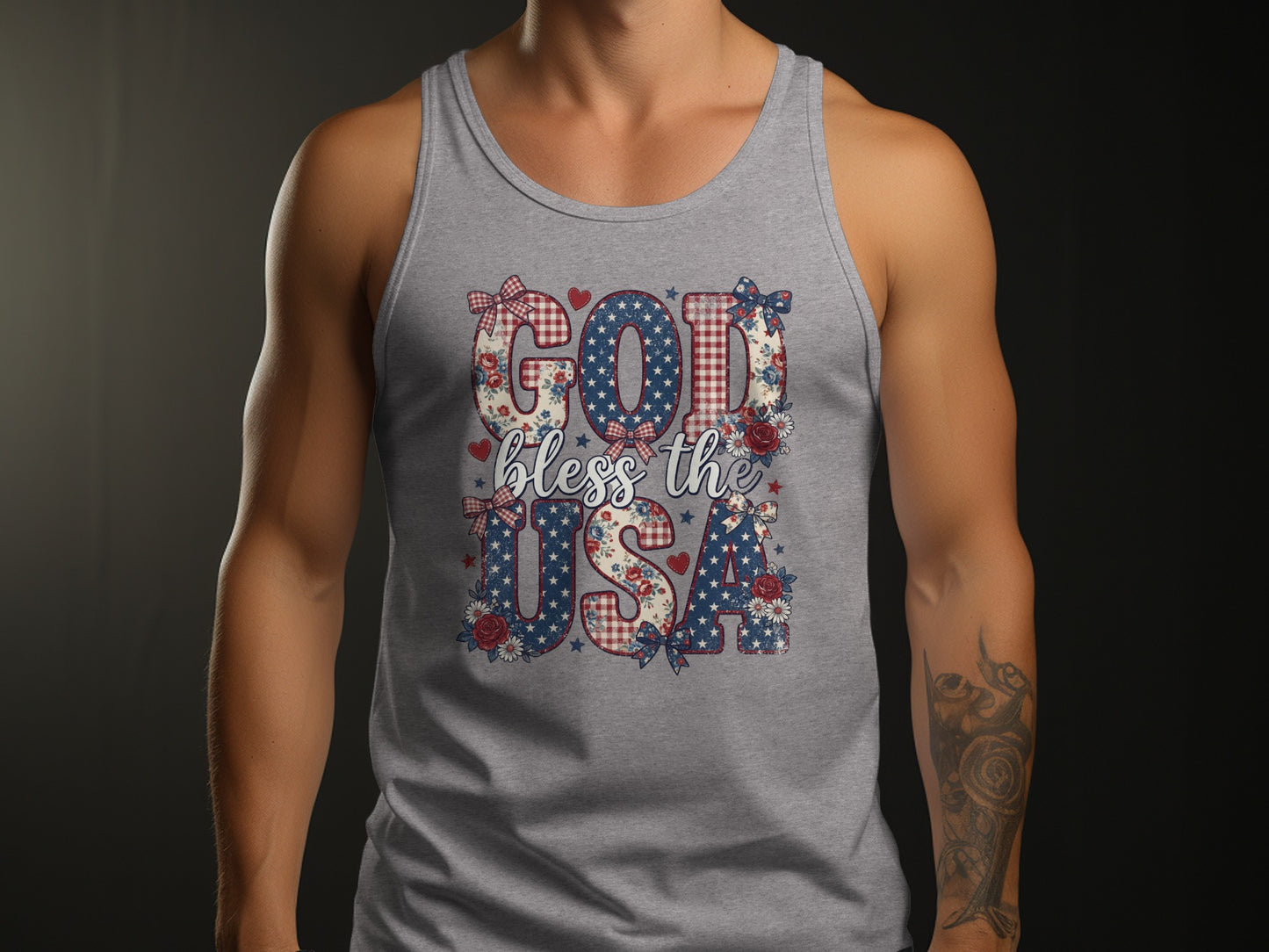 Grey tank top with "God bless the USA" in patriotic floral and gingham patterns.