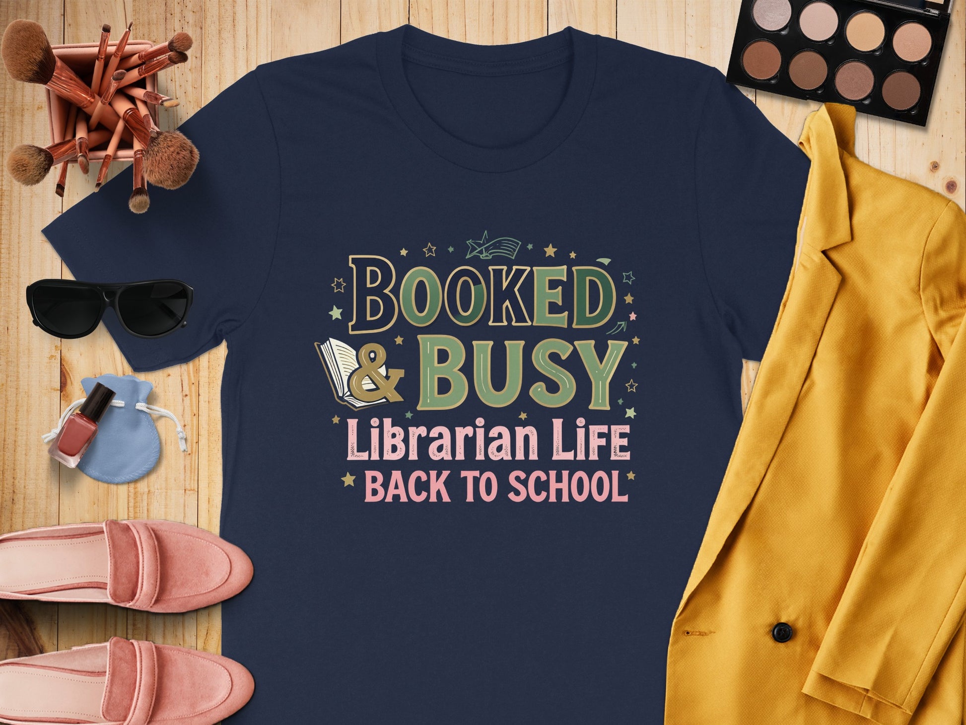 Navy t-shirt with "BOOKED & BUSY Librarian Life BACK TO SCHOOL" text.
