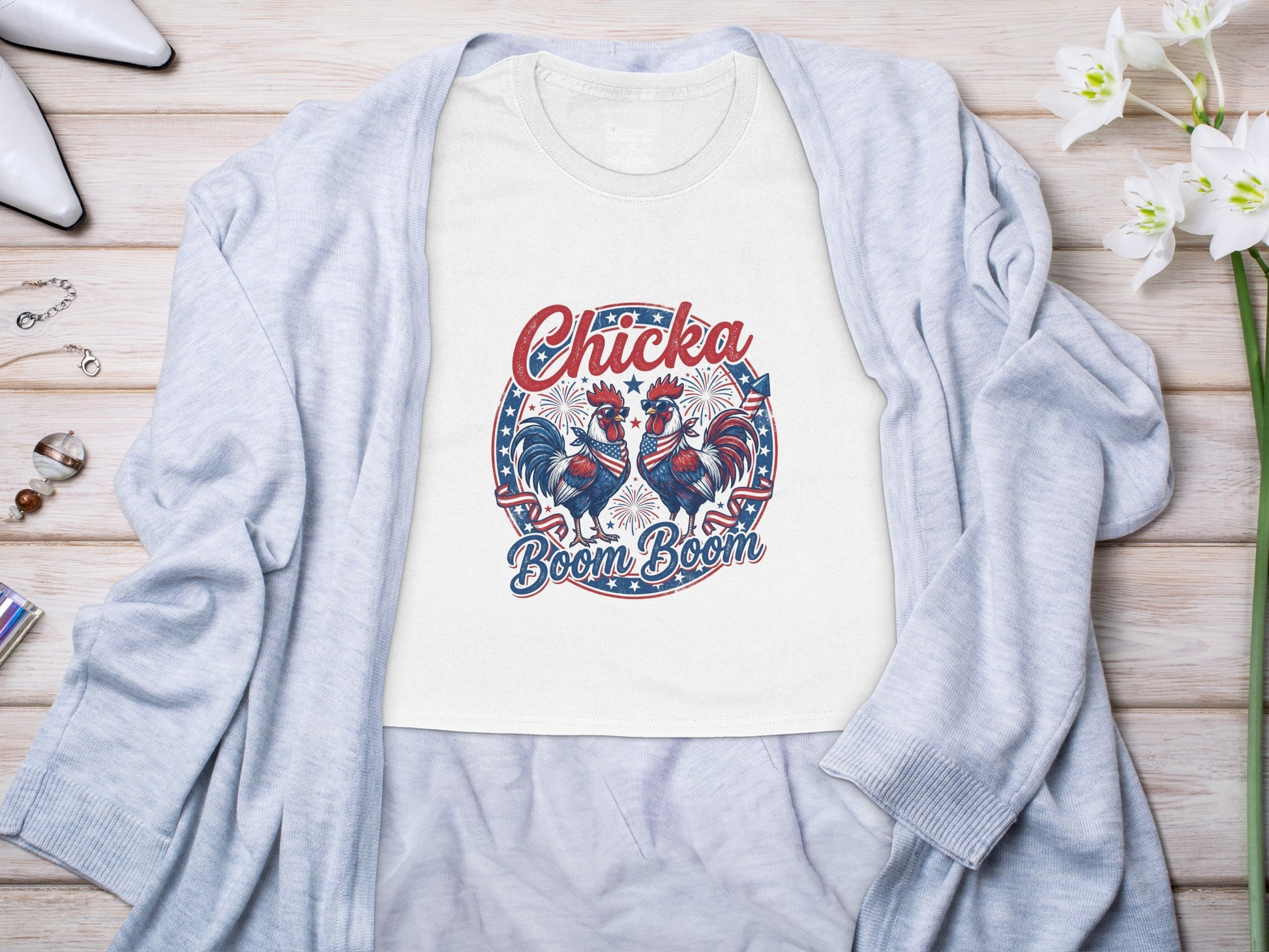 White t-shirt with roosters and "Chicka Boom Boom" text.