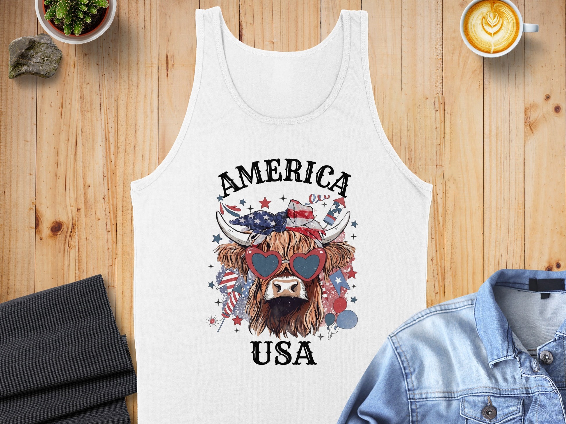 Highland cow with heart sunglasses and American flag bandana saying "AMERICA USA".