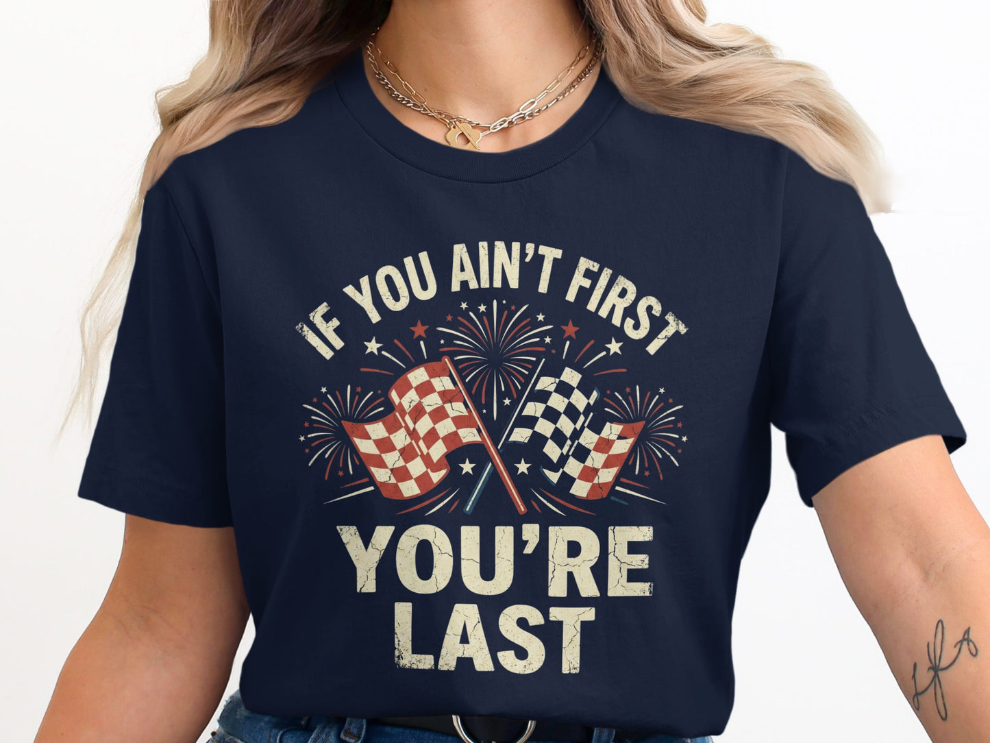 Navy t-shirt with checkered flags, fireworks, and "IF YOU AIN'T FIRST YOU'RE LAST" text.