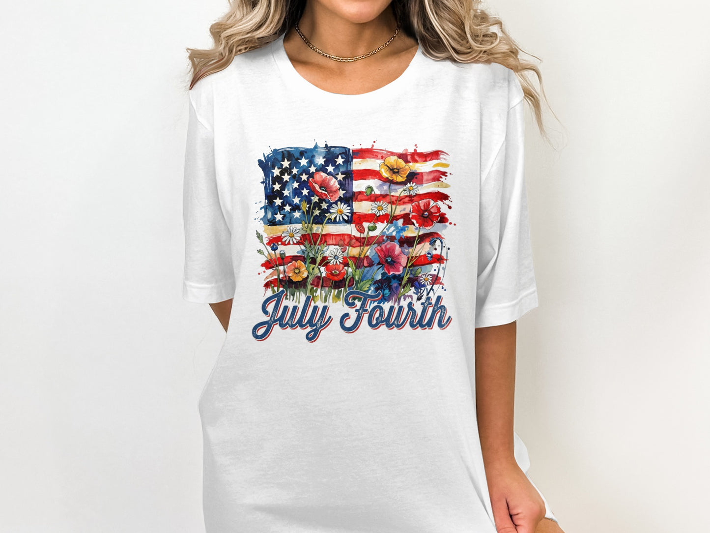 White t-shirt with watercolor American flag and flowers, "July Fourth" text.