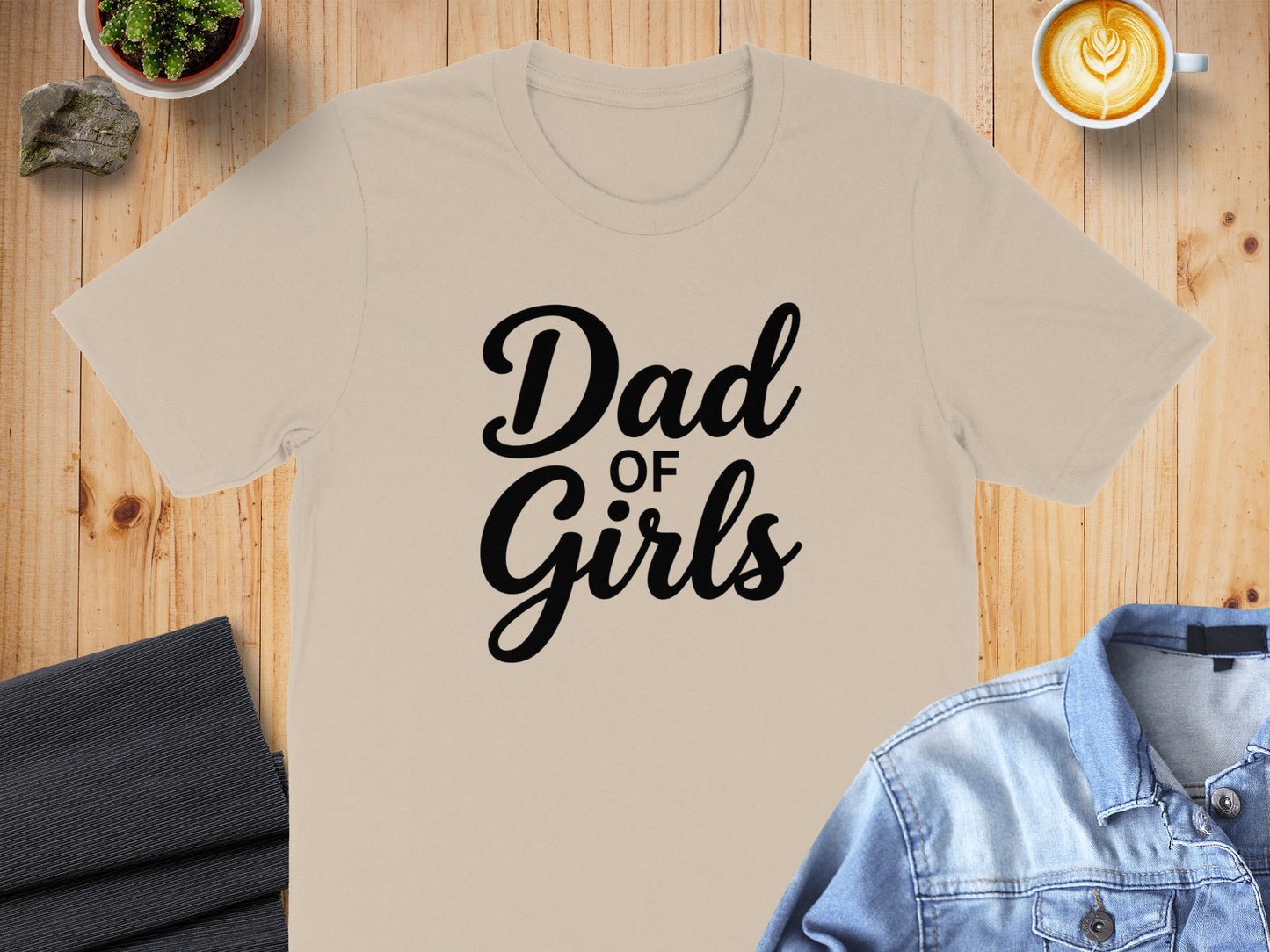 T-shirt with "Dad of Girls" text, denim jacket, and coffee.