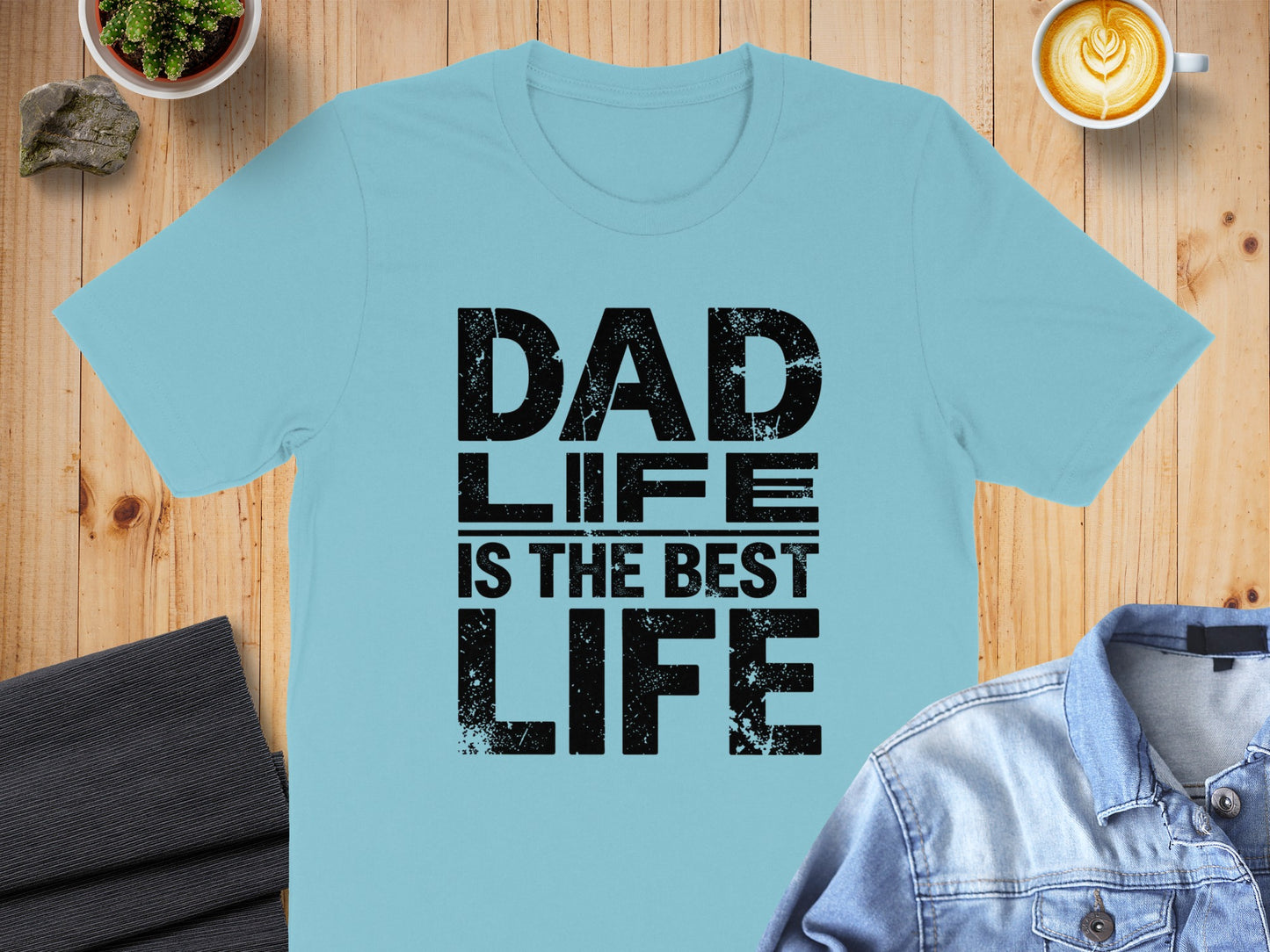 Light blue t-shirt with "DAD LIFE IS THE BEST LIFE" text.