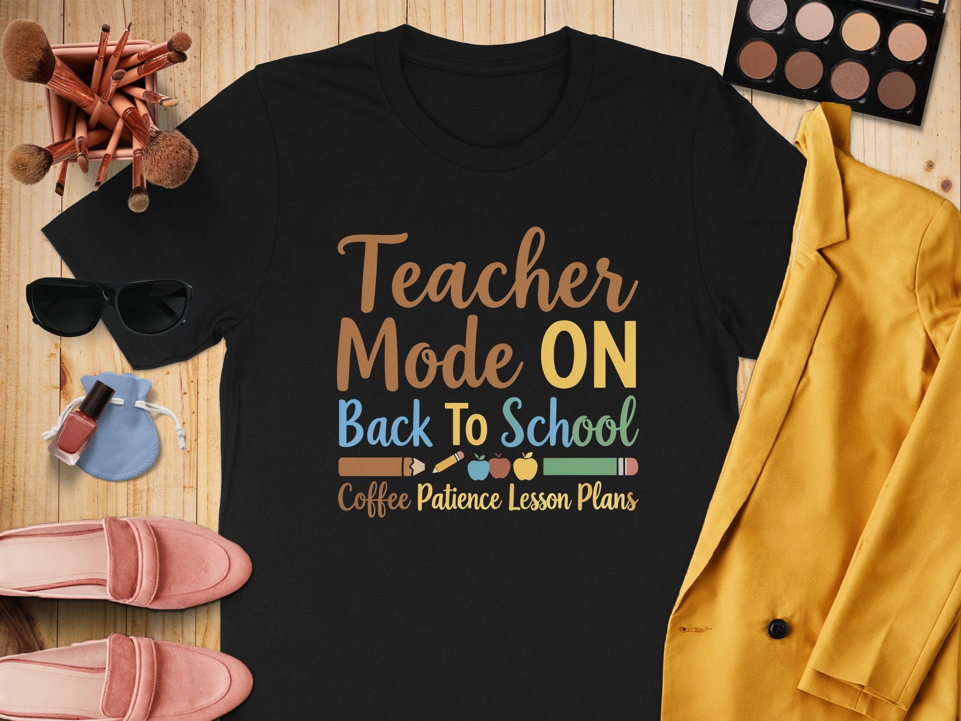 Black t-shirt with "Teacher Mode ON Back To School Coffee Patience Lesson Plans" graphic.
