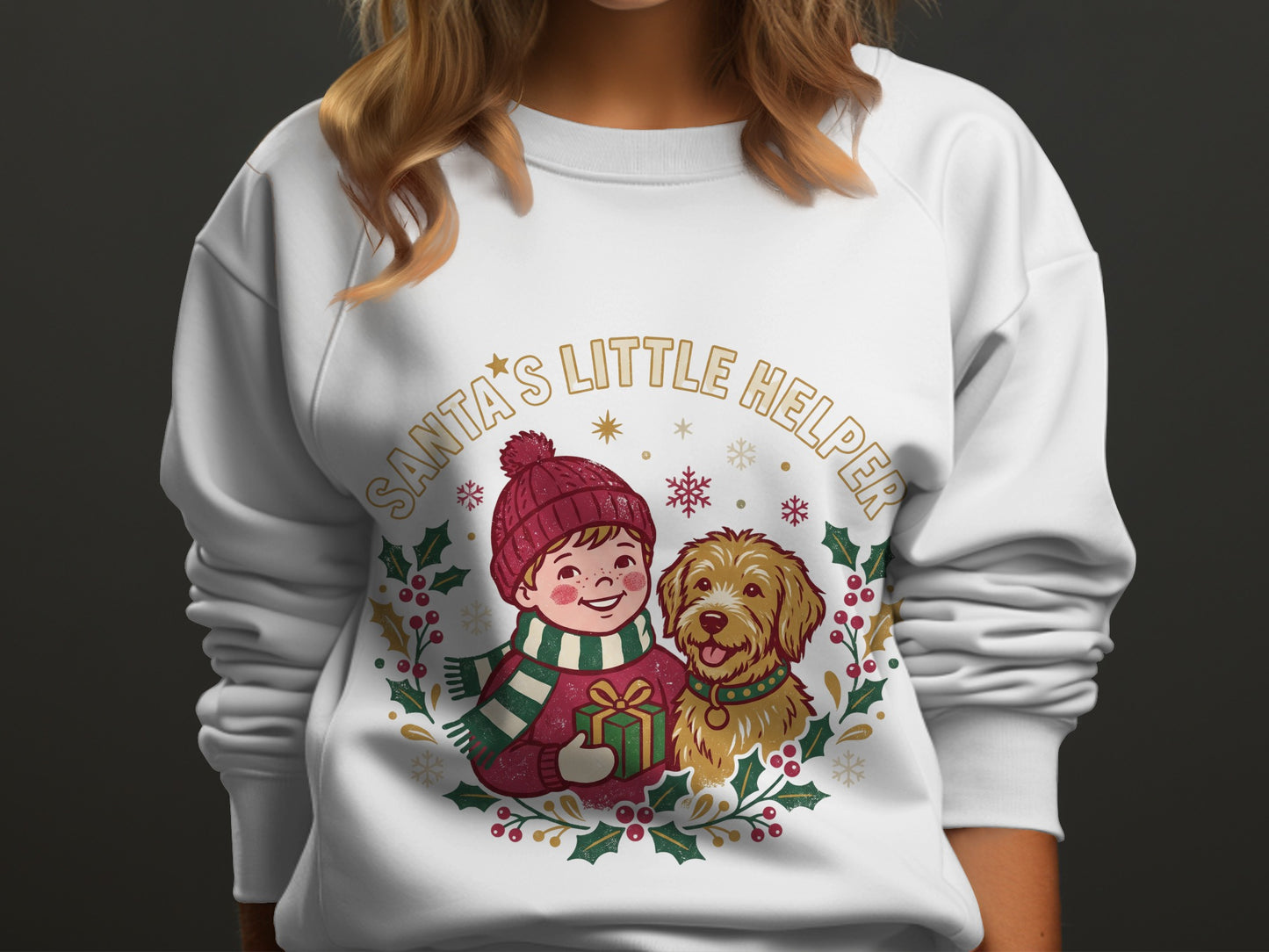 White sweatshirt with "Santa's Little Helper" text and festive child and dog graphic.