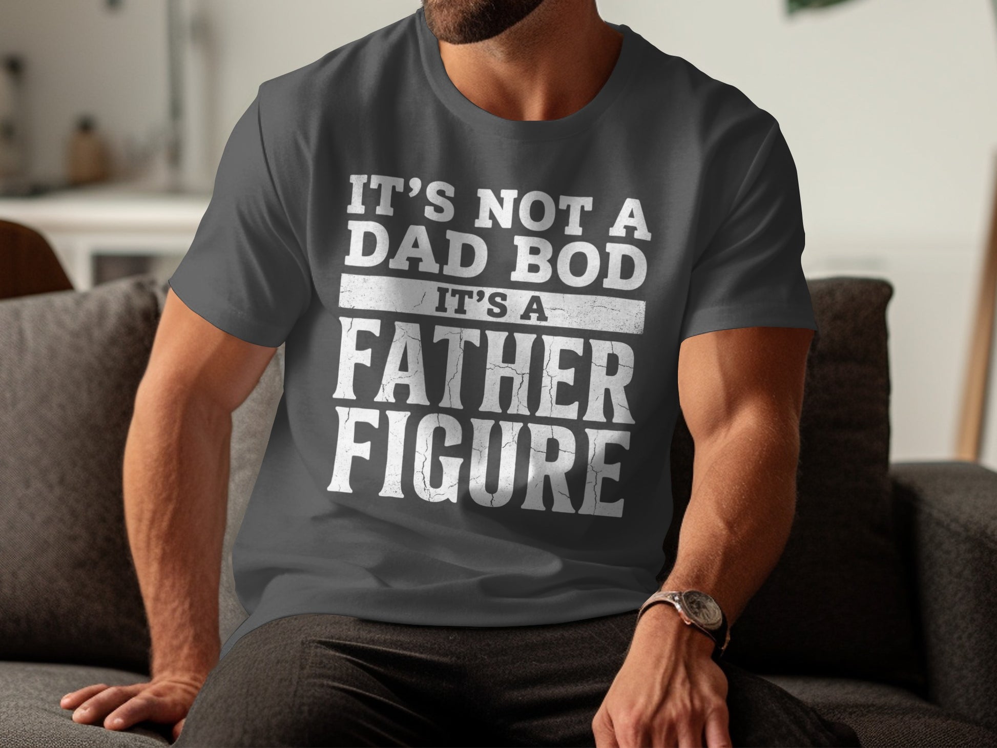 Gray t-shirt with white text: "It's not a dad bod, it's a father figure."