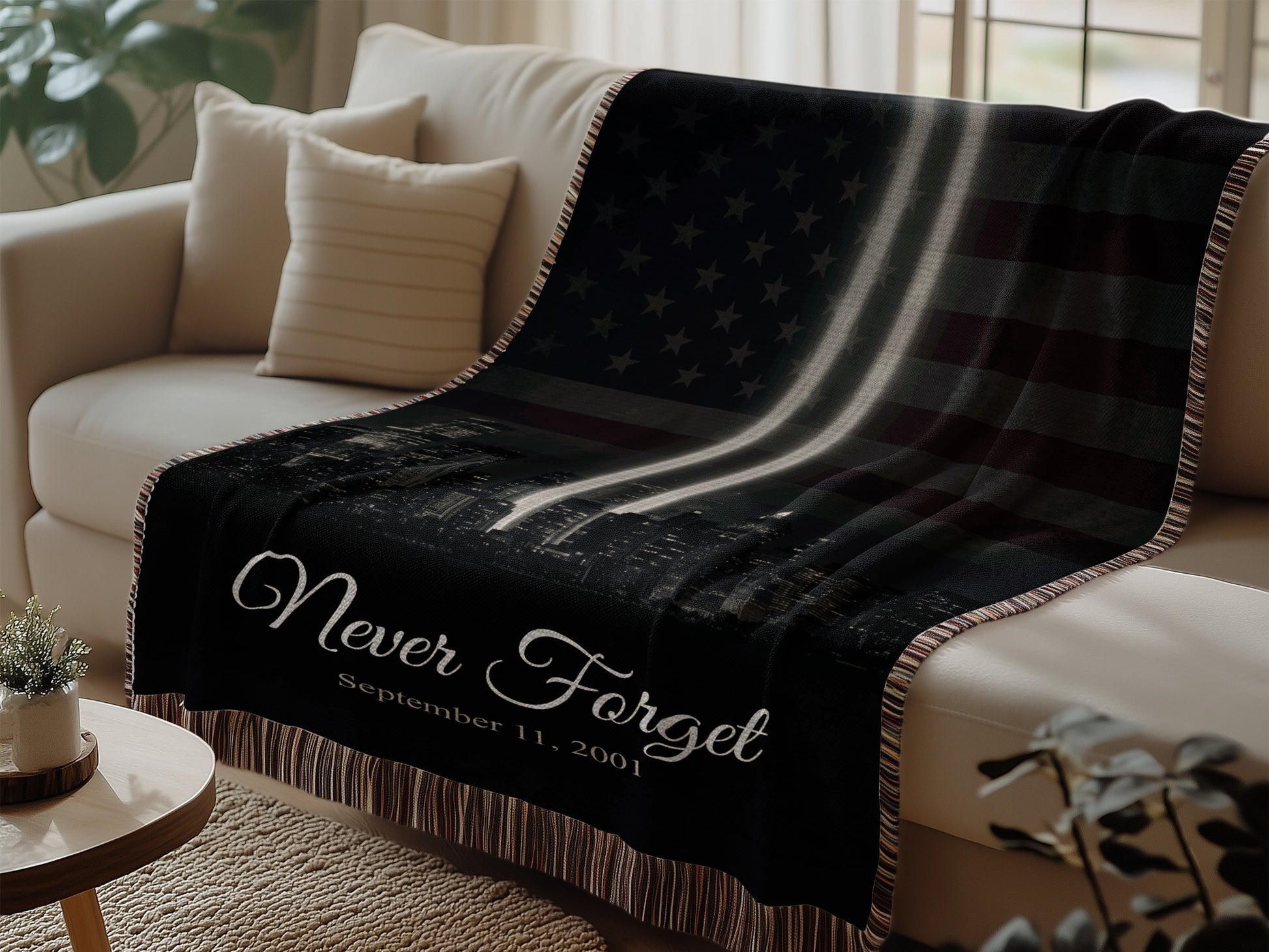 Black blanket with Tribute in Light beams design, "Never Forget September 11, 2001".