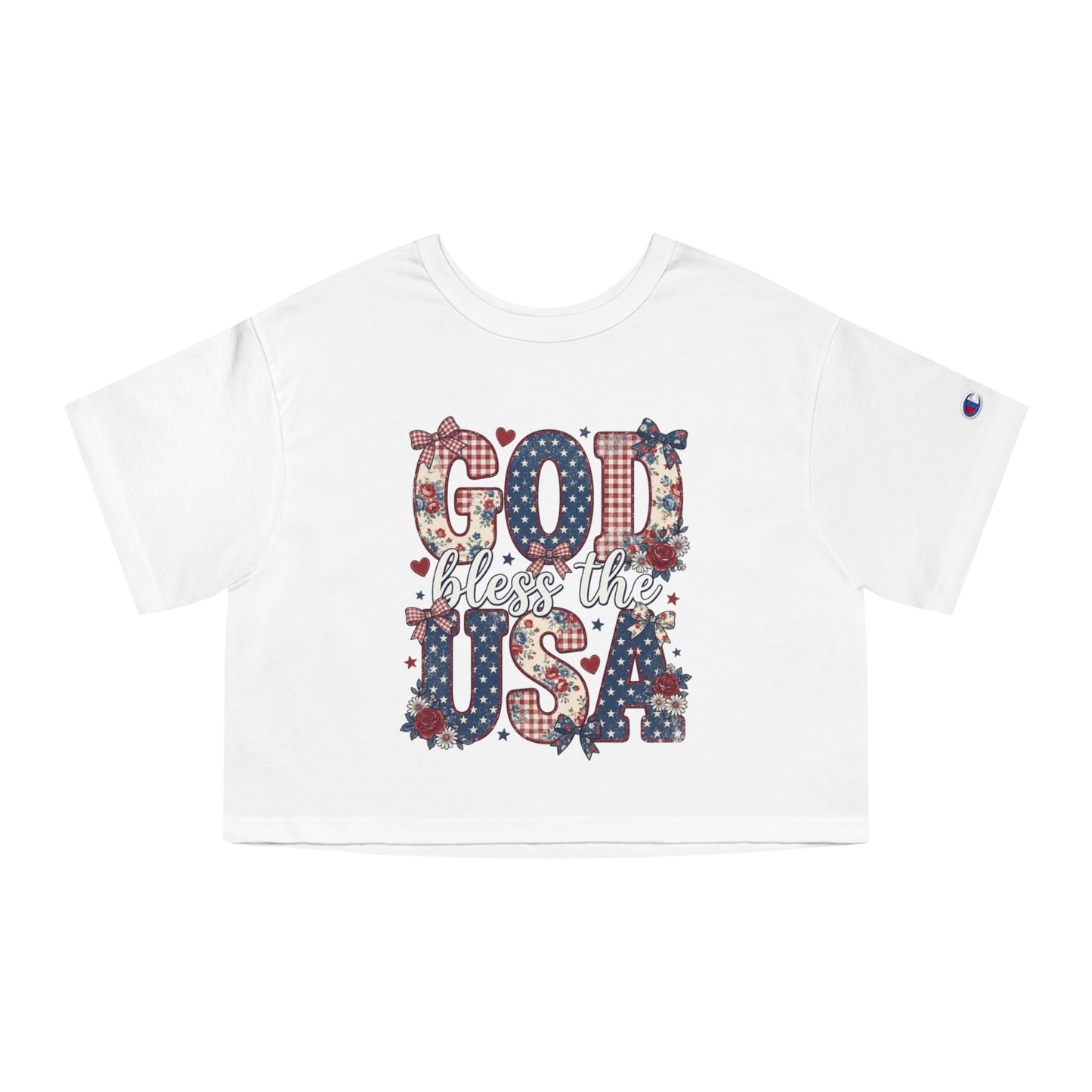 White crop top with "God bless the USA" text and patriotic floral patterns.