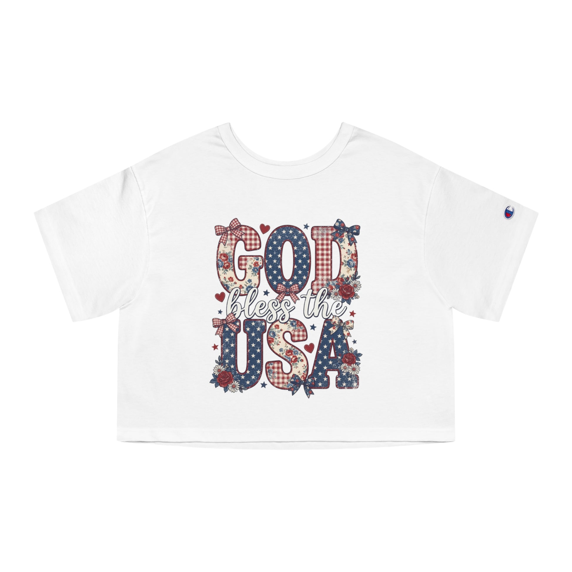 White crop top with "God bless the USA" text and patriotic floral patterns.