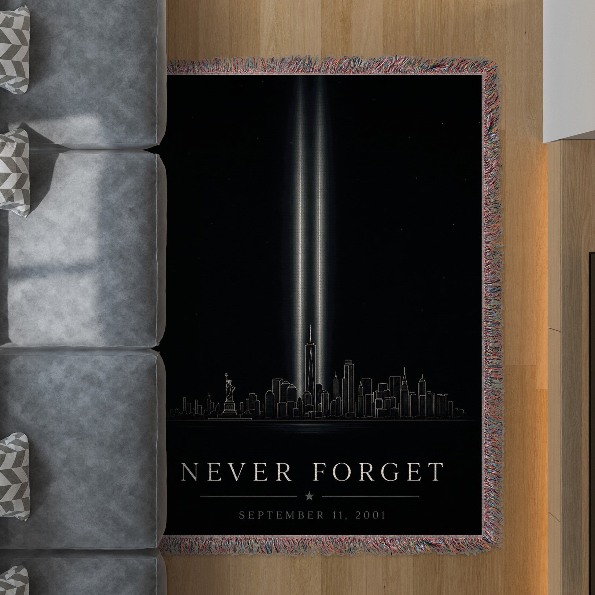 Tapestry depicts the "Tribute in Light," New York City skyline and "Never Forget September 11, 2001."