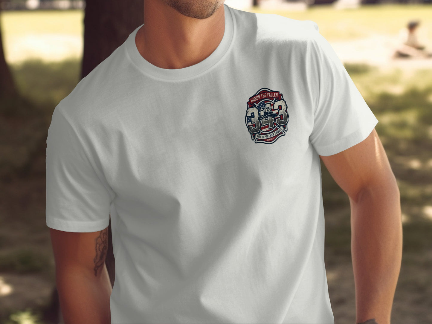 White t-shirt with a "343 Honor the Fallen" badge featuring a firefighter's helmet.