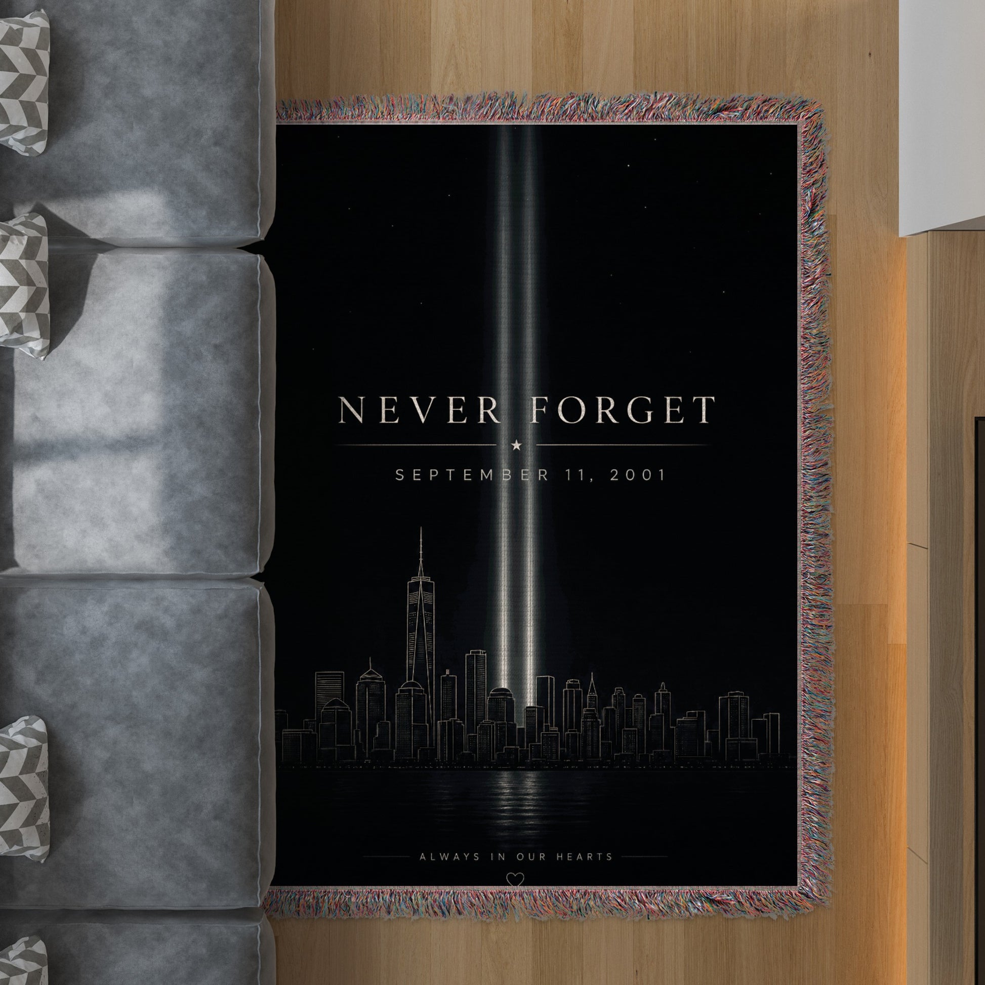 Tribute blanket with "Never Forget September 11, 2001" and NYC skyline.