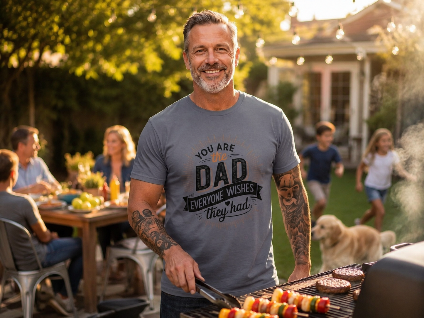 Dad wearing The Dad Everyone Wishes For Bold Typographic T-Shirt barbecuing in backyard lifestyle image