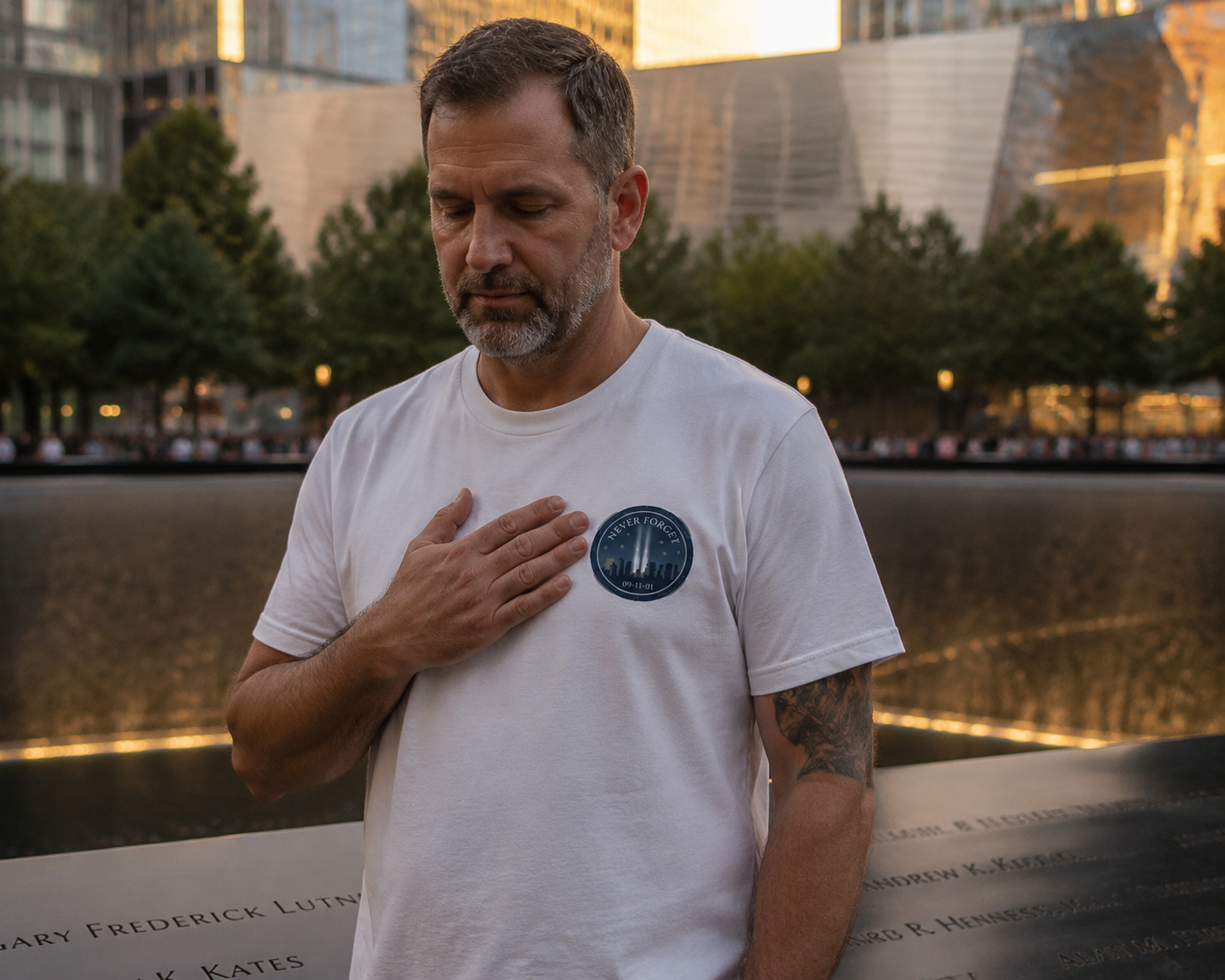 Lifestyle mockup - Never Forget 9/11 Skyline Tee B at reflecting pool