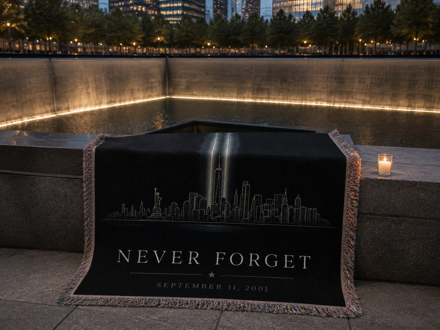 Never Forget 9/11 memorial blanket at the 9/11 memorial reflecting pool