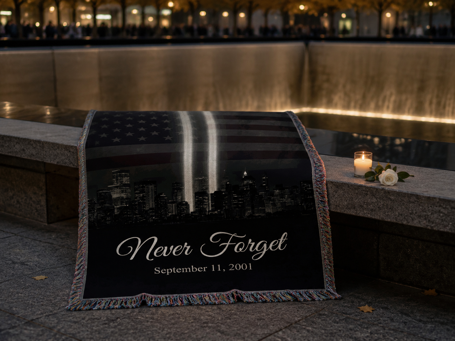 Never Forget 9/11 patriotic memorial blanket at the 9/11 memorial reflecting pool