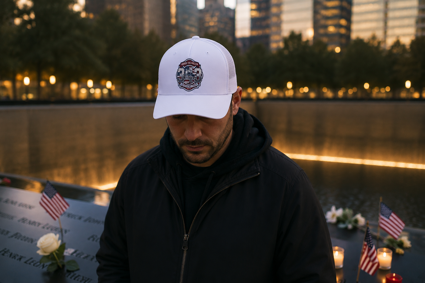 Lifestyle mockup - 343 Firefighter Tribute Hat at reflecting pool dusk